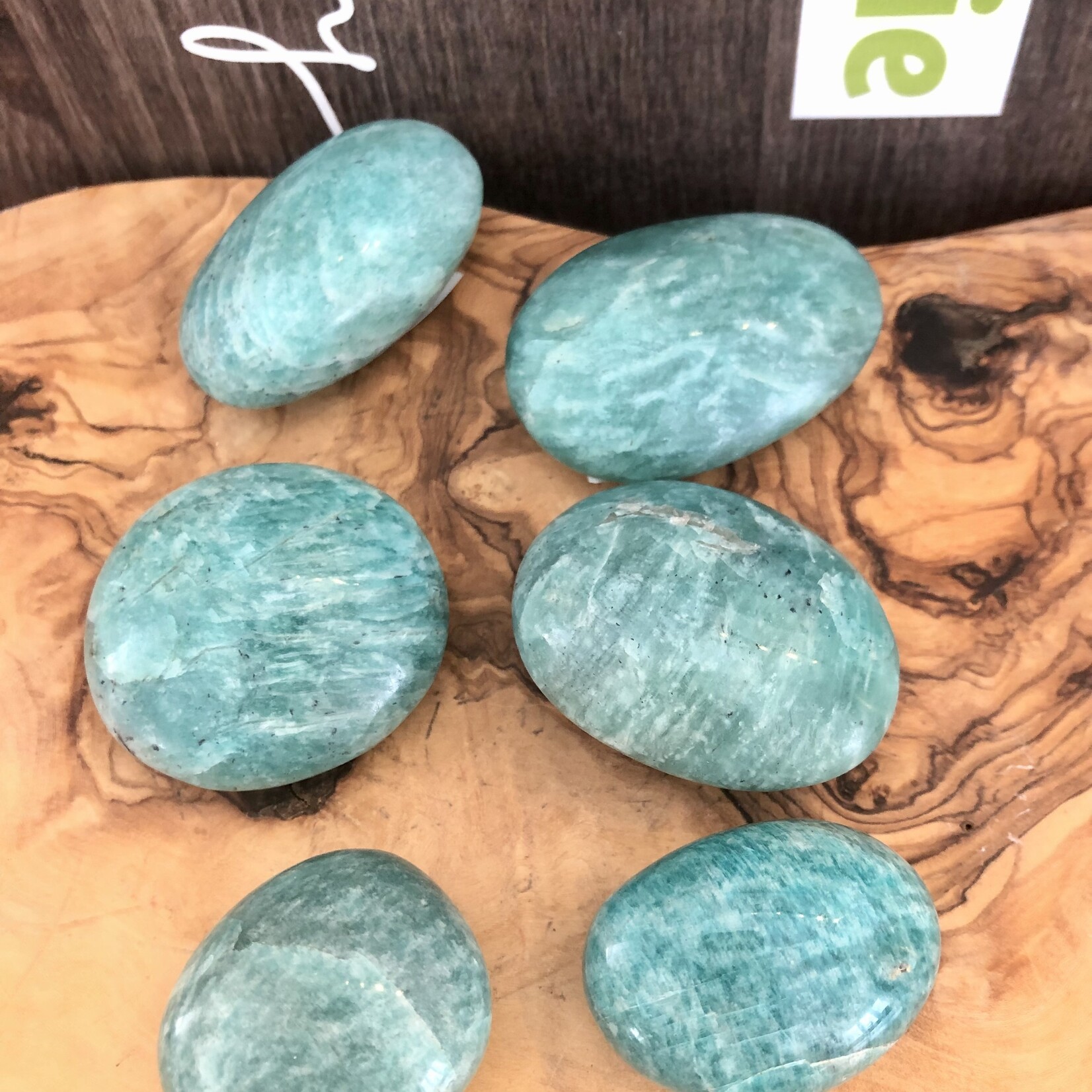 sparkling amazonite tumbled stone, perfect as a palm stone, exacerbates happiness and promotes love, compassion and forgiveness