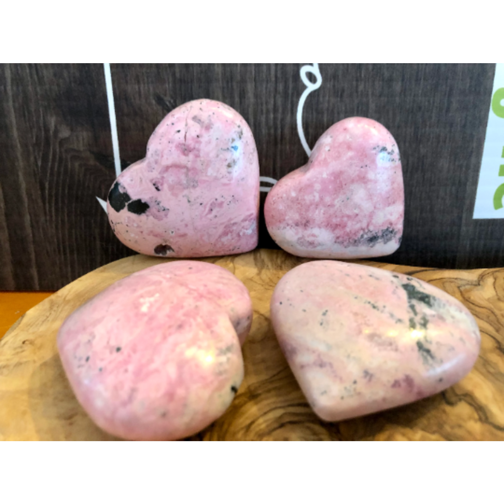 natural rhodonite heart, stone against traumas