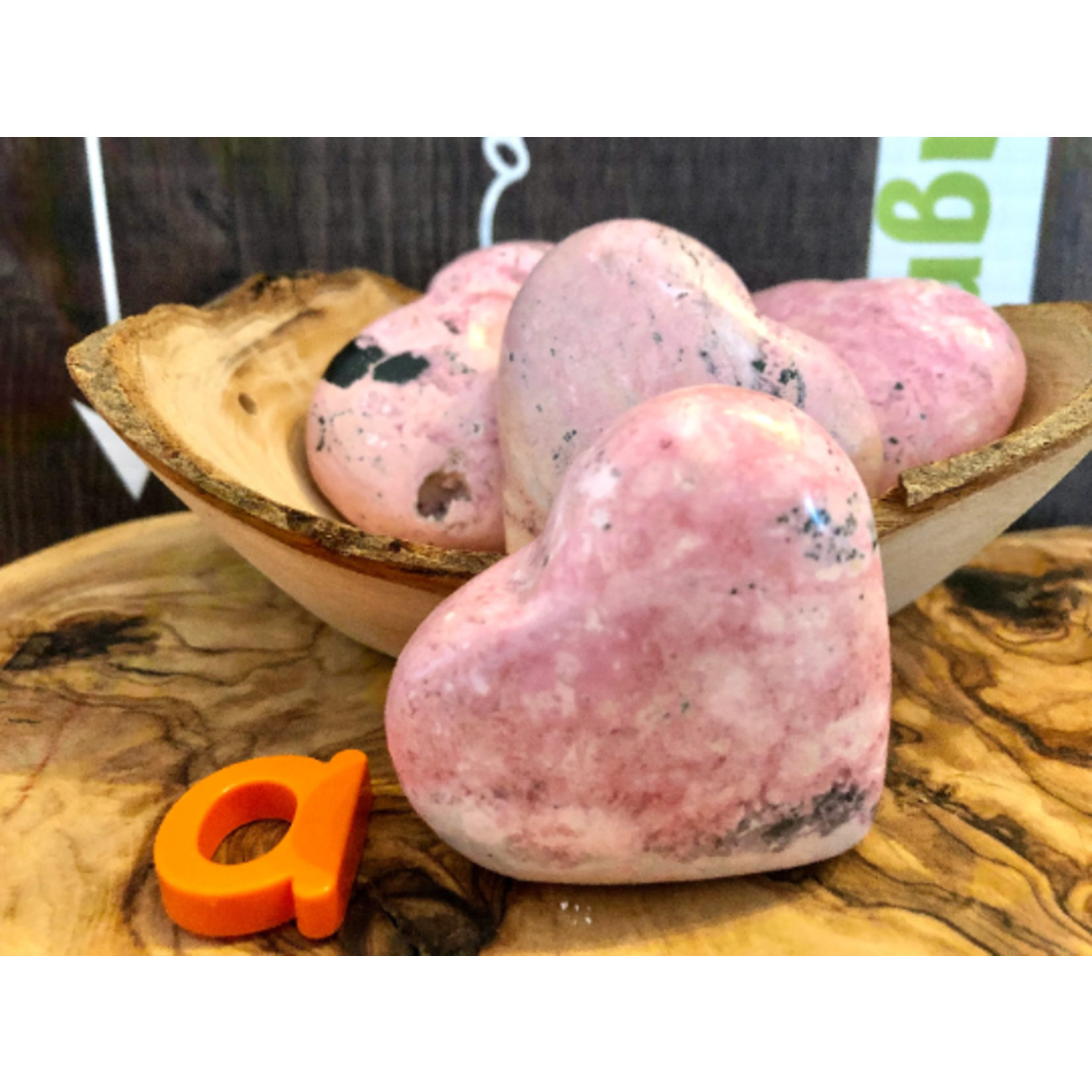 natural rhodonite heart, stone against traumas