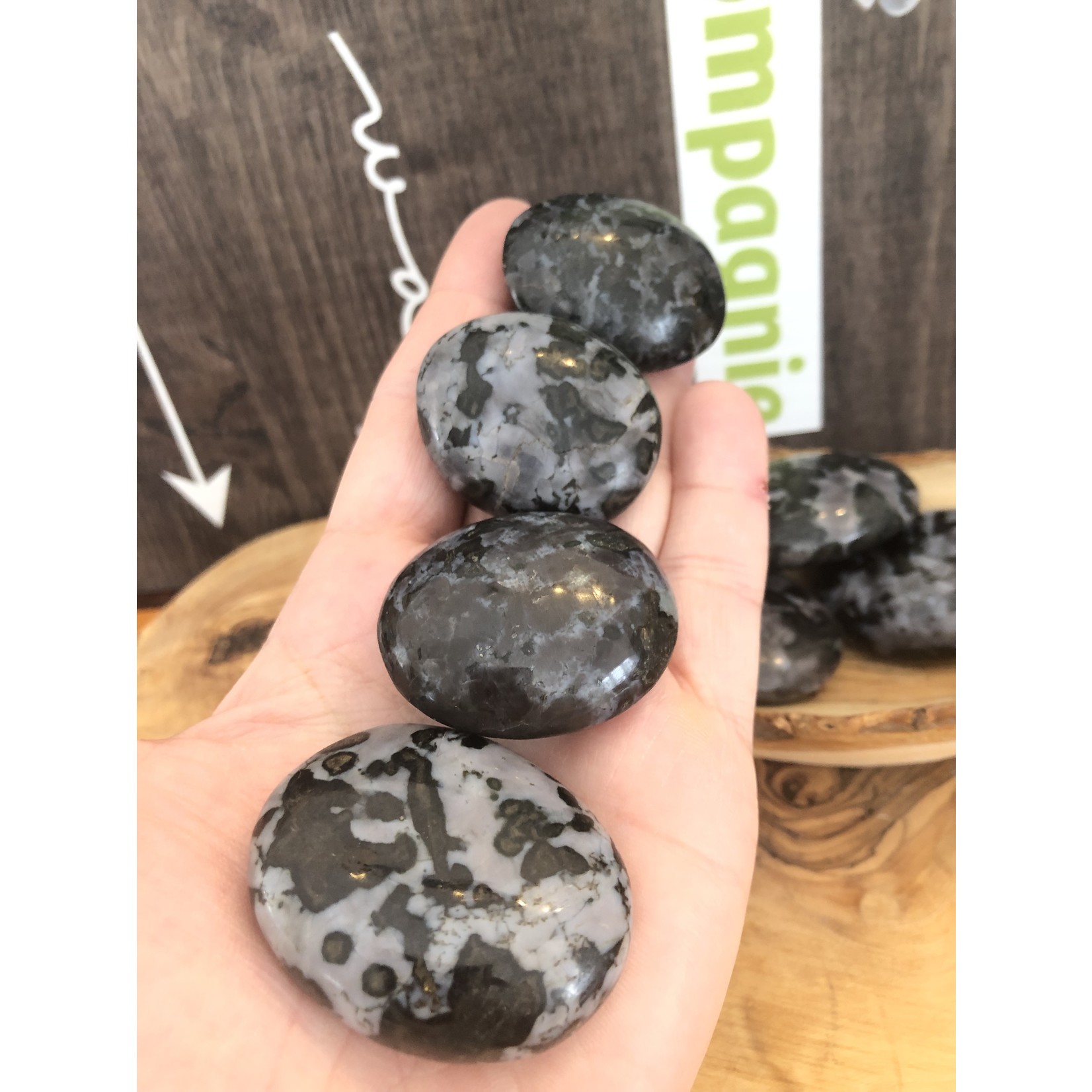 soft merlinite gabbro pebble, also called mystical merlinite, stone in homage to the magician Merlin, it would be a magic stone