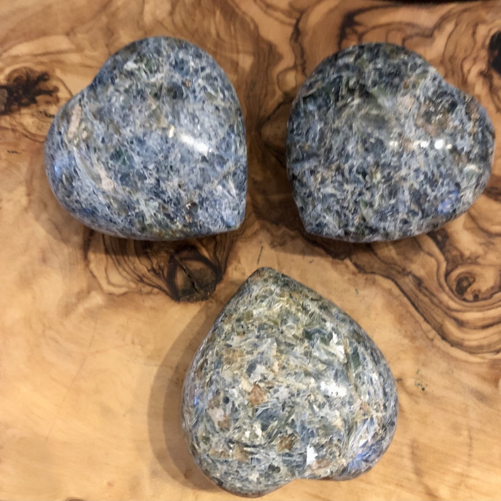 large polished heart kyanite, is a positive stone, helps in self-confidence, which promotes intuition and communication