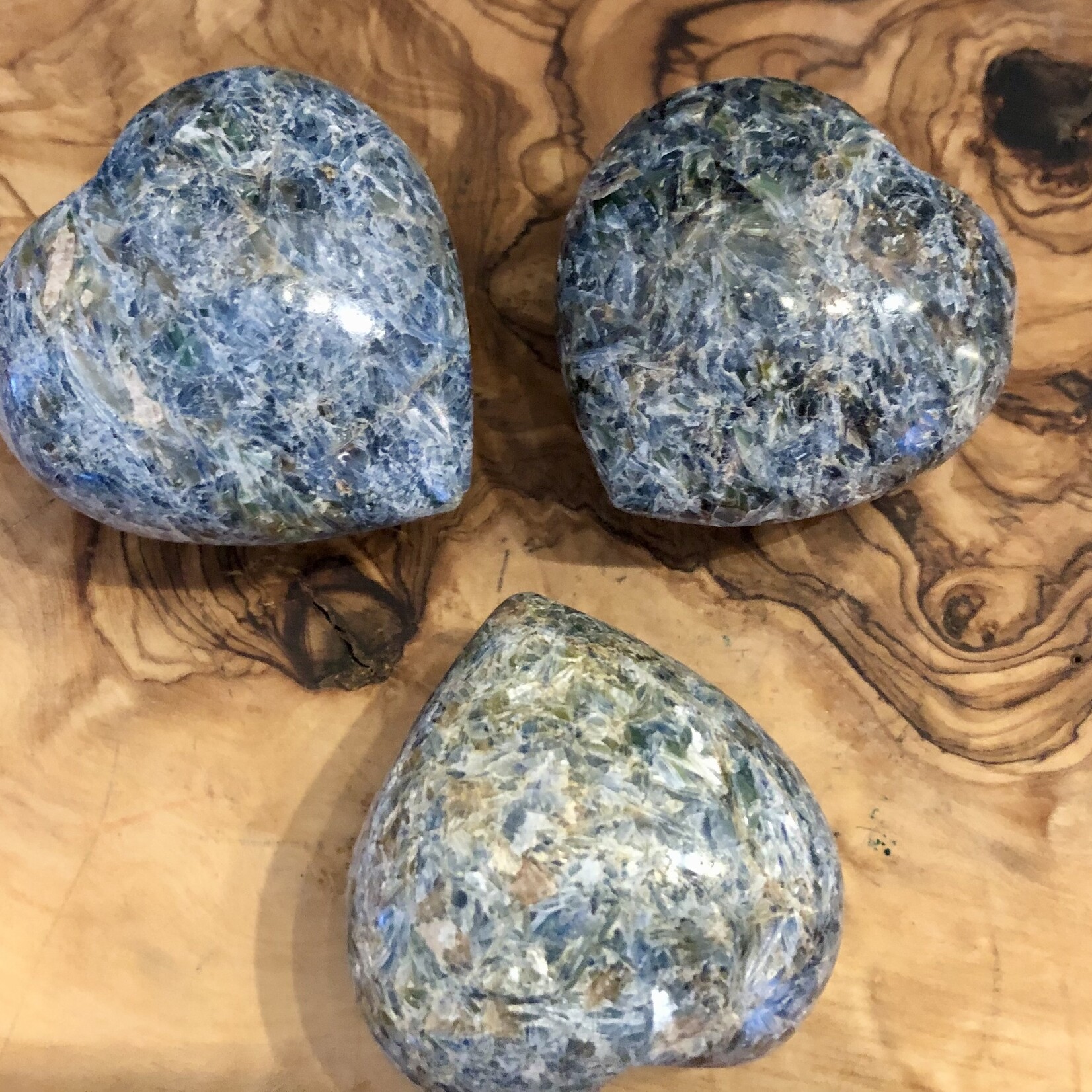 large polished heart kyanite, is a positive stone, helps in self-confidence, which promotes intuition and communication