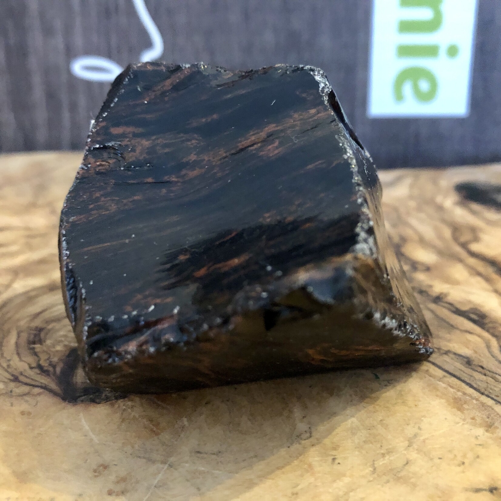 beautiful mahogany obsidian polished, used to relieve various types of pain such as muscle aches or cramps