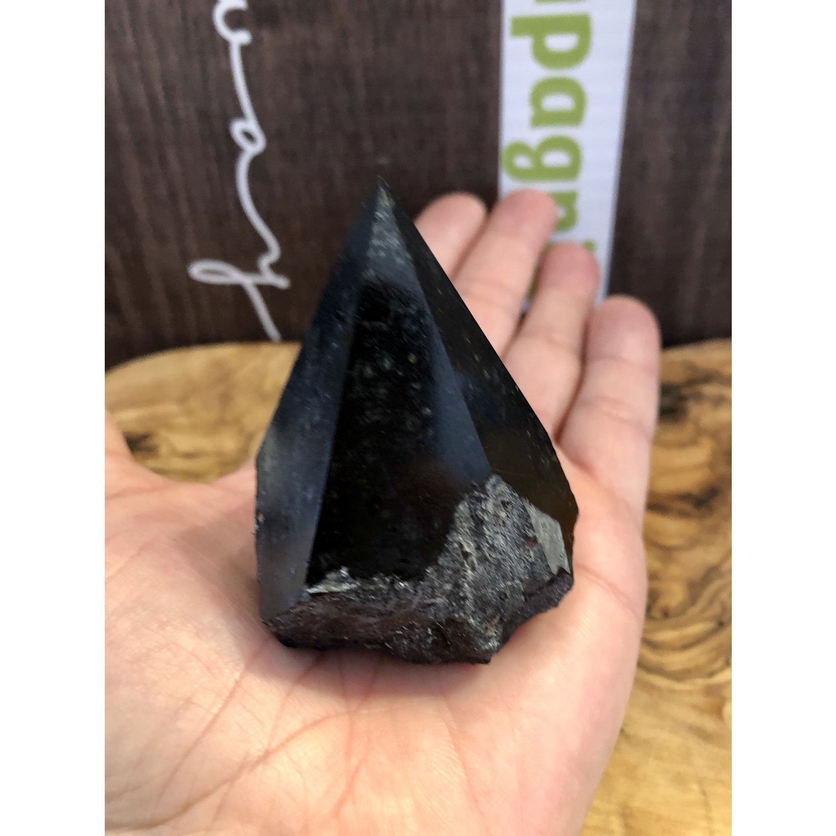 natural black tourmaline top polished, will be mainly used on the root chakra or in contact with the soles of the feet