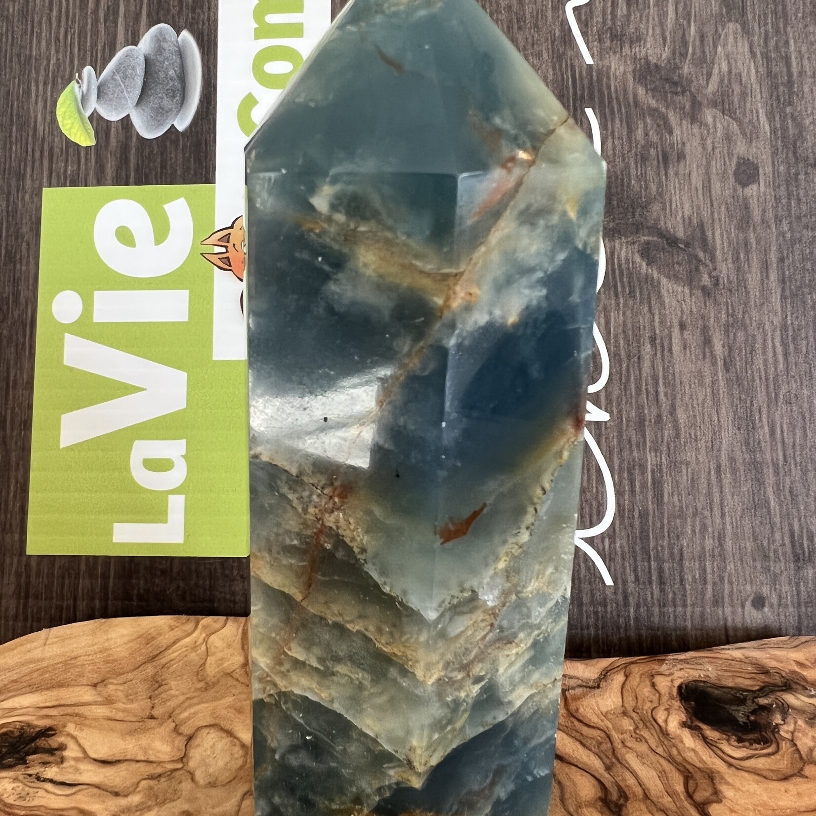 large blue onyx tower, blue onyx polished, known to gain stamina, strength of character and determination