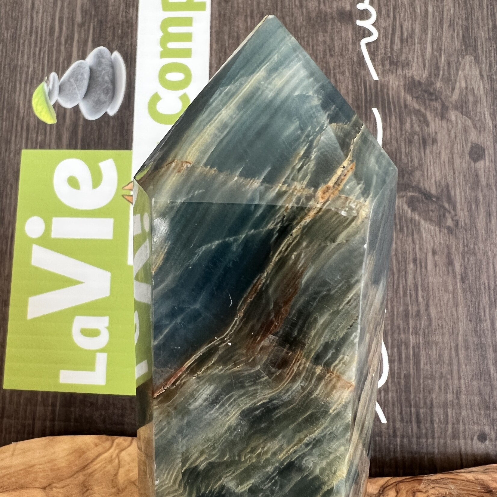 large blue onyx tower, blue onyx polished, known to gain stamina, strength of character and determination