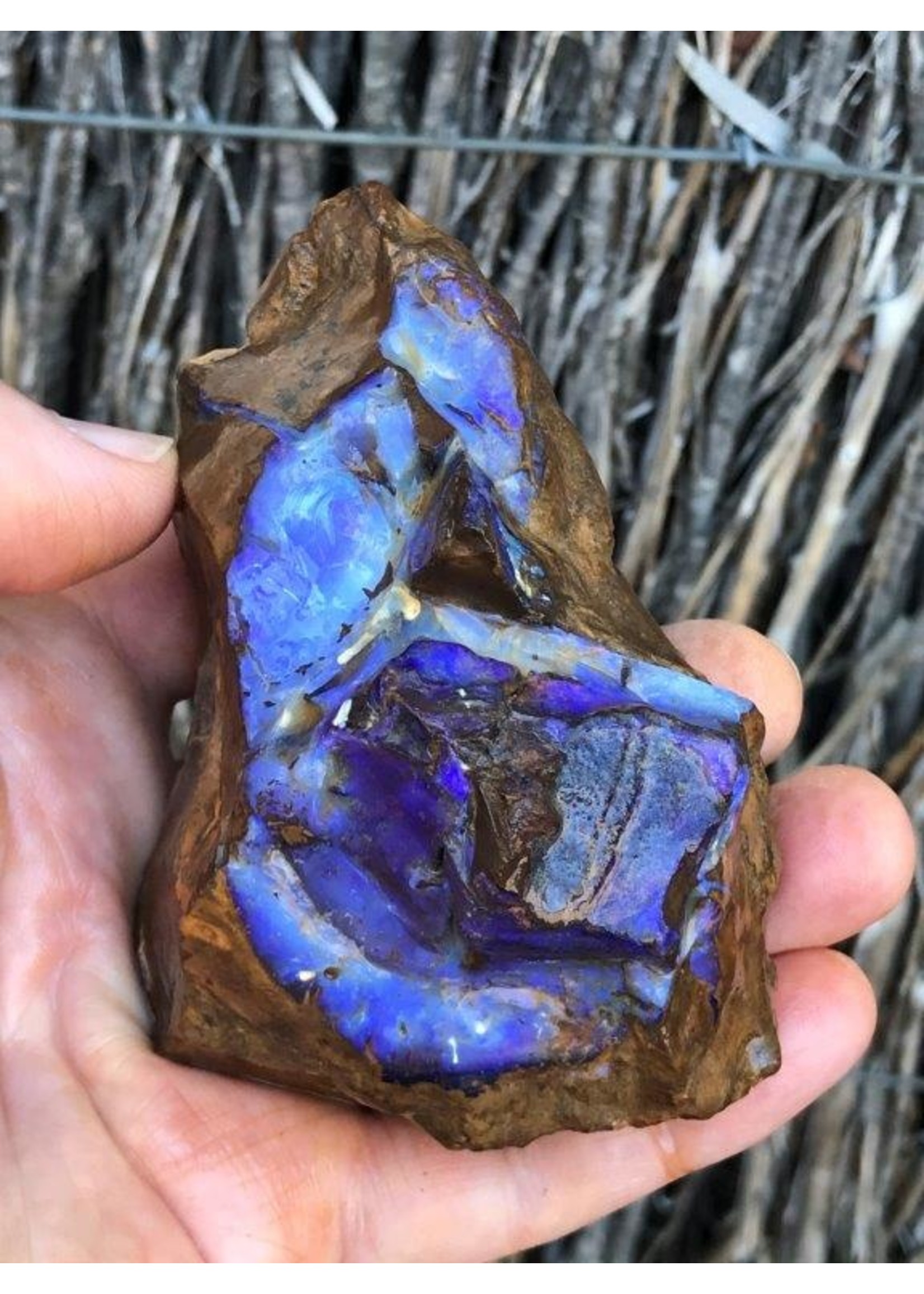 magnificent rough boulder opal, opal from Australia, influences blood circulation and soothes mood swings and boosts self-confidence