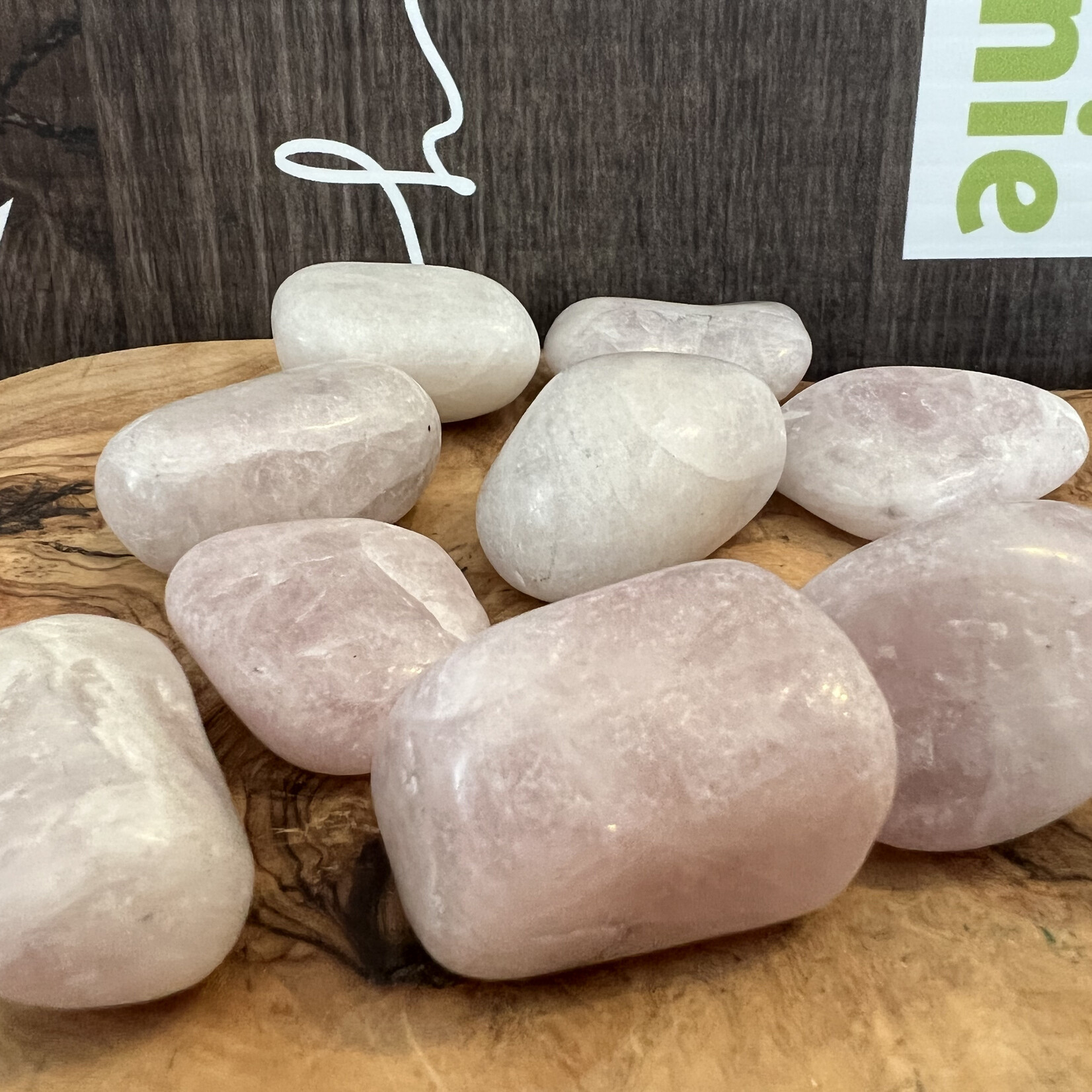 kunzite tumbled stone, used to calm migraines, neck pain due to blood pressure, exhaustion or overwork