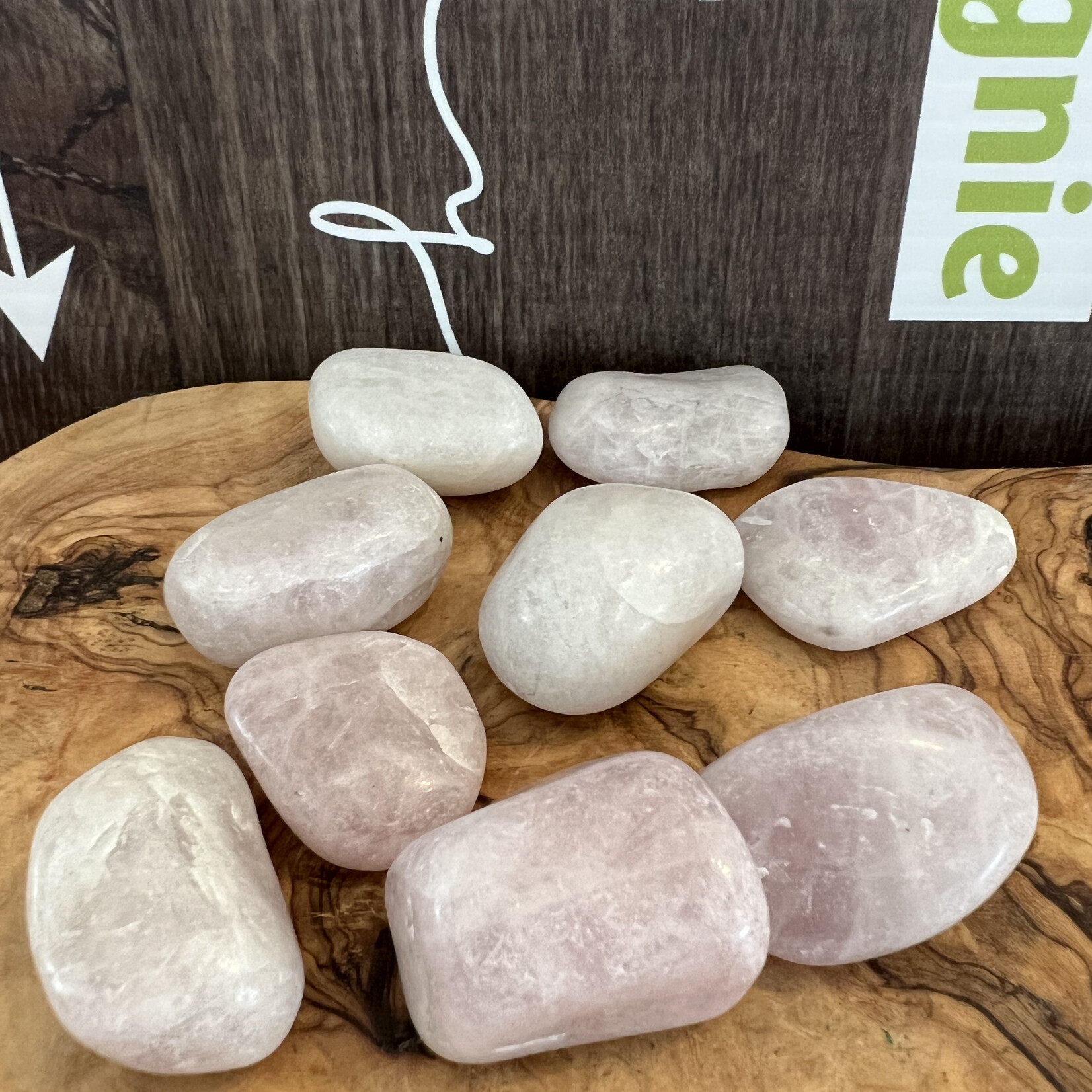 kunzite tumbled stone, used to calm migraines, neck pain due to blood pressure, exhaustion or overwork