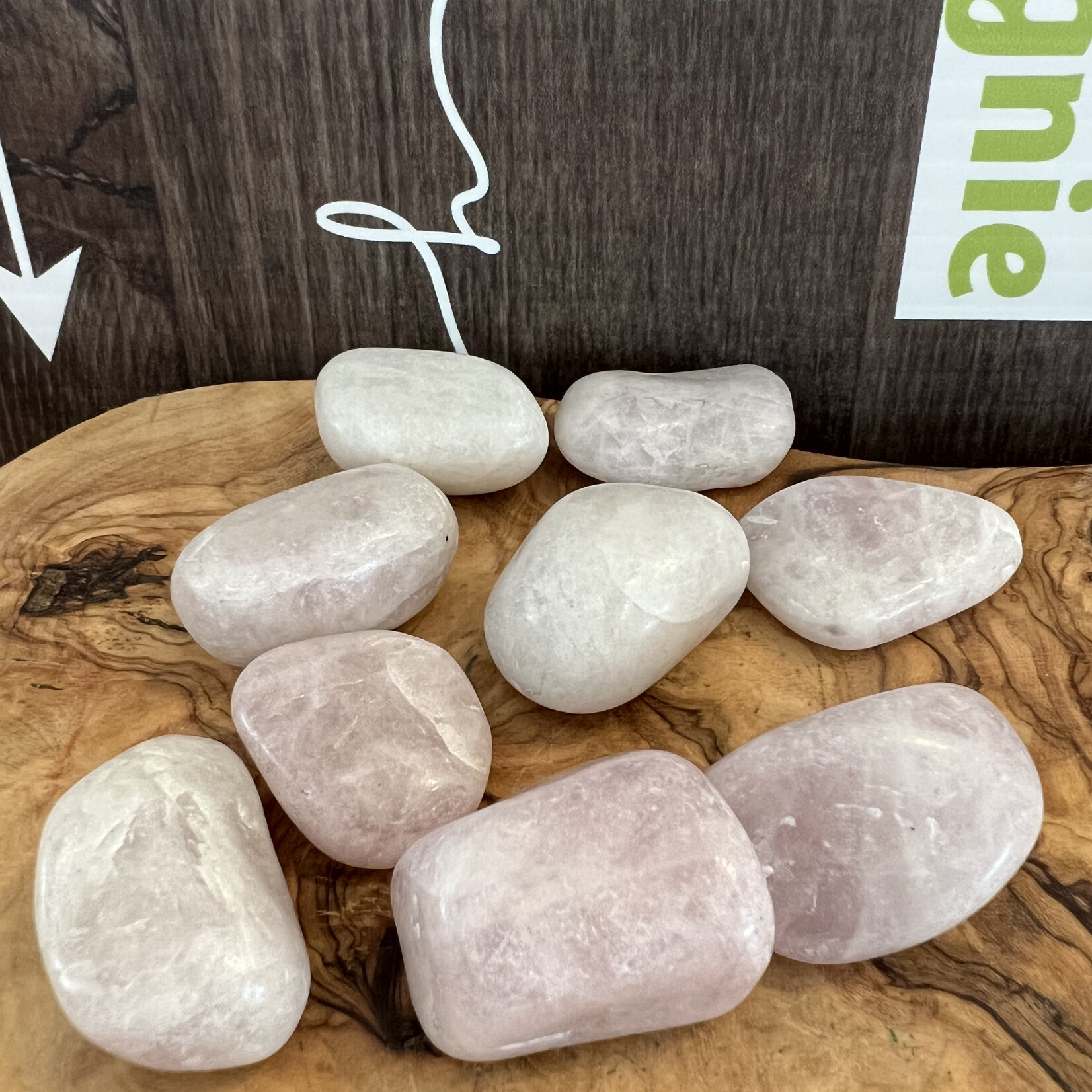 kunzite tumbled stone, used to calm migraines, neck pain due to blood pressure, exhaustion or overwork