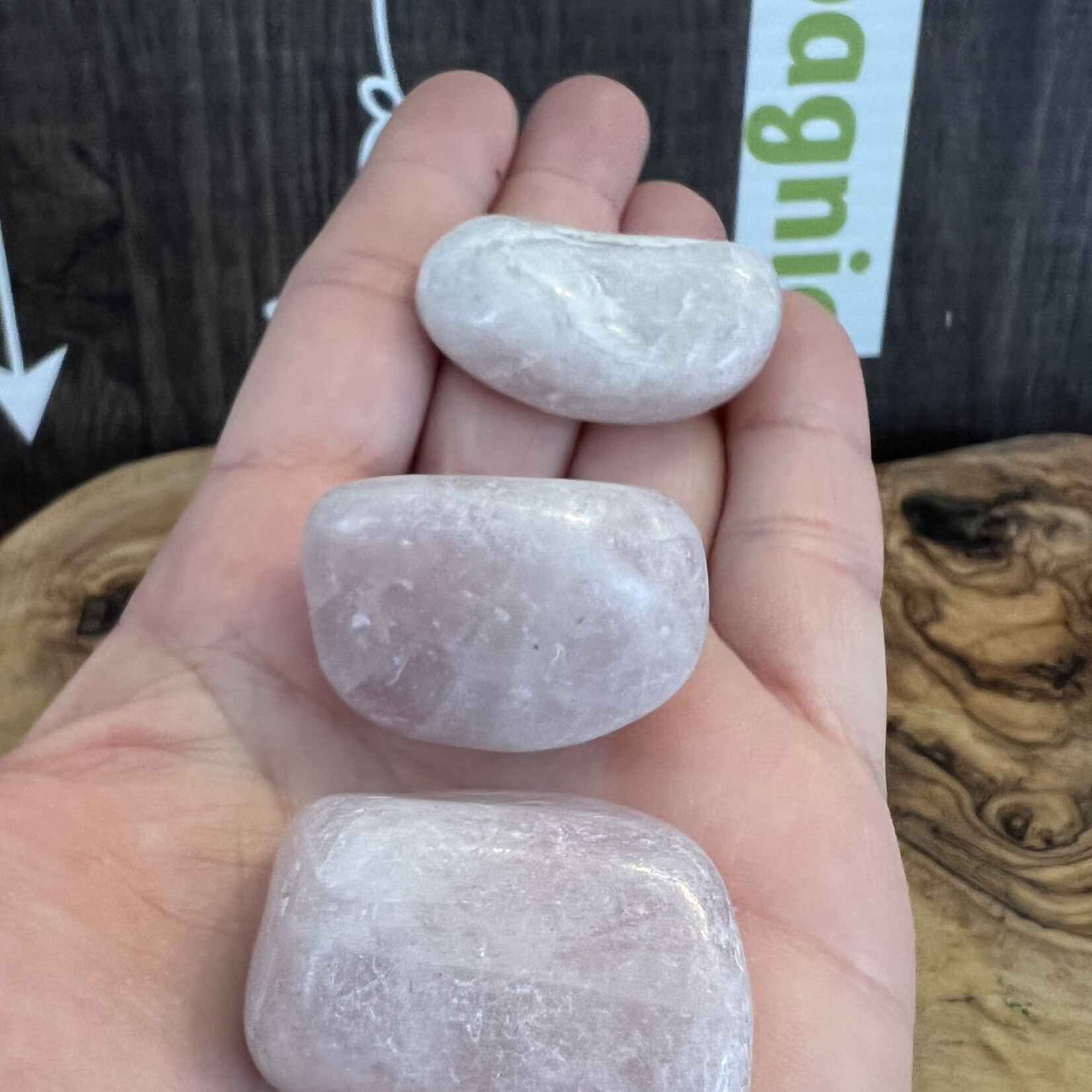 kunzite tumbled stone, used to calm migraines, neck pain due to blood pressure, exhaustion or overwork