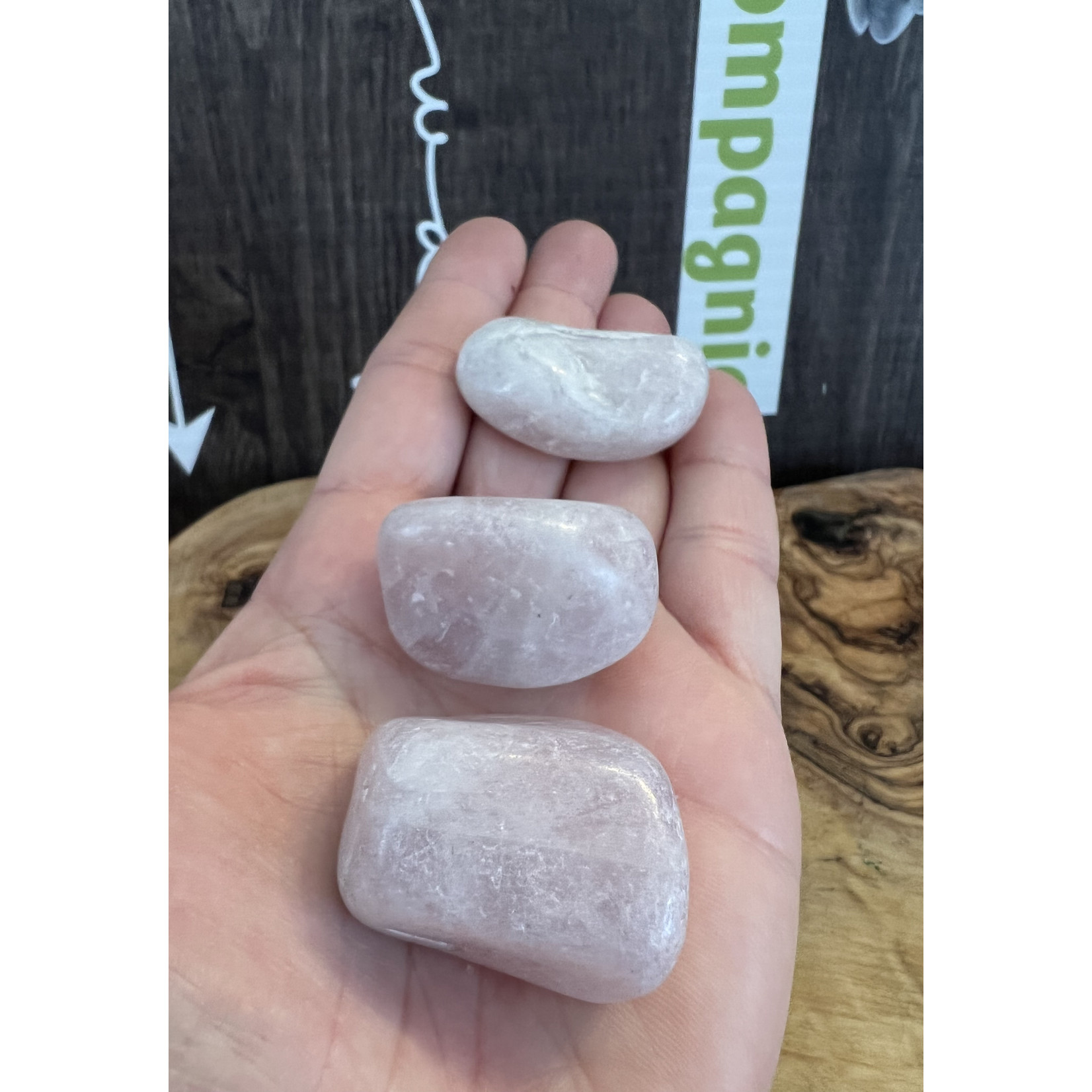 kunzite tumbled stone, used to calm migraines, neck pain due to blood pressure, exhaustion or overwork