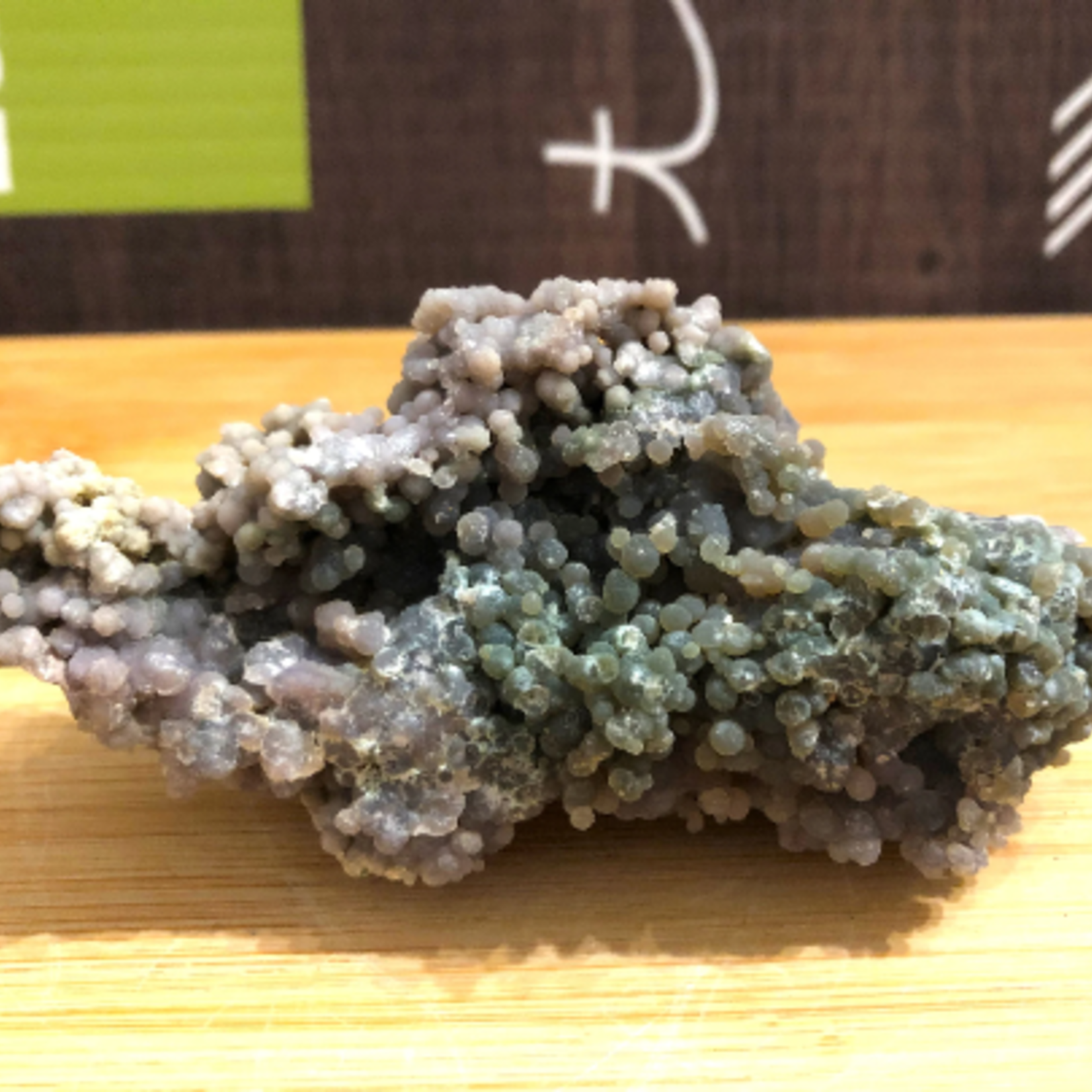 large grape agate cluster, also known as purple botryoid chalcedony, purple Manakarra chalcedony, leads us towards serenity