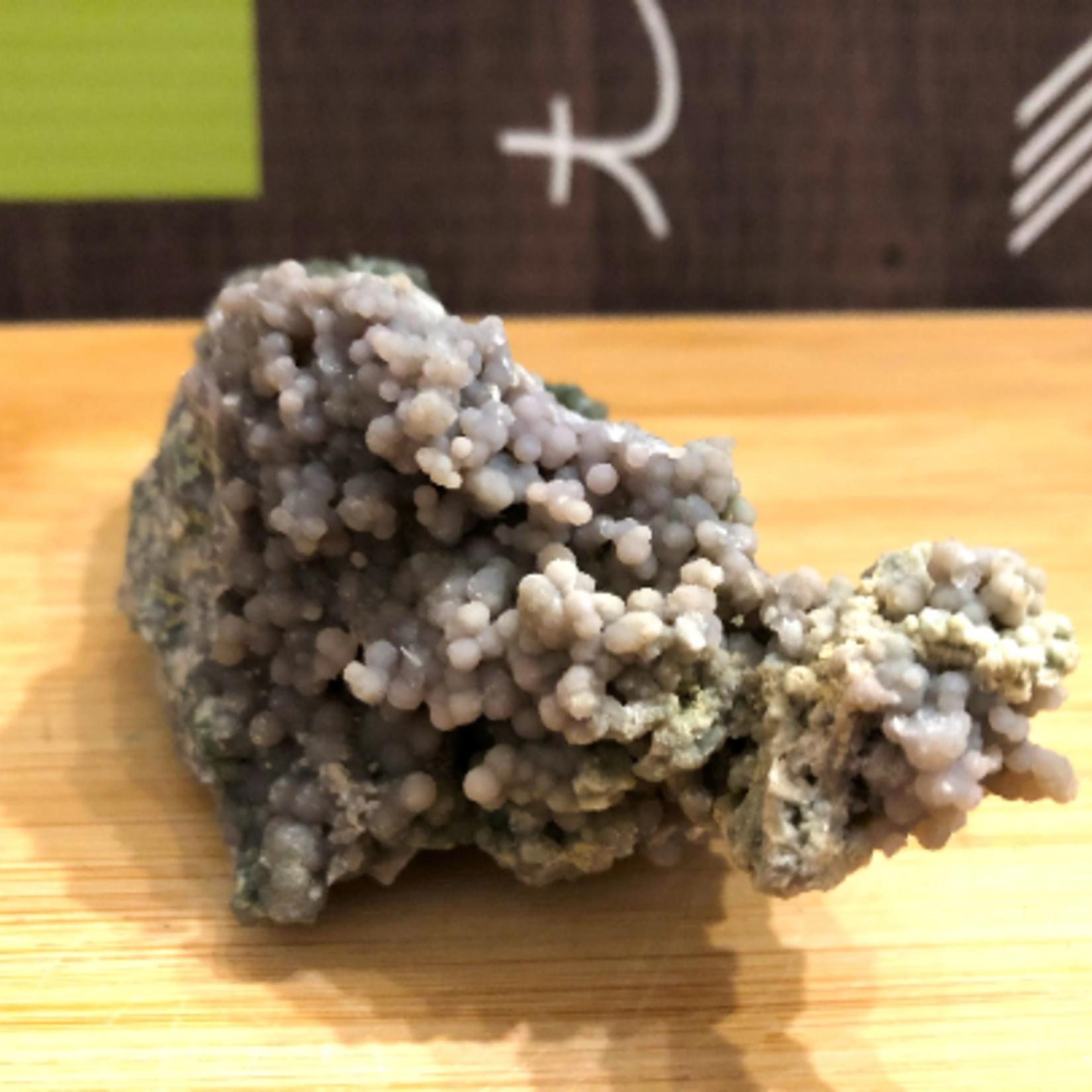 large grape agate cluster, also known as purple botryoid chalcedony, purple Manakarra chalcedony, leads us towards serenity