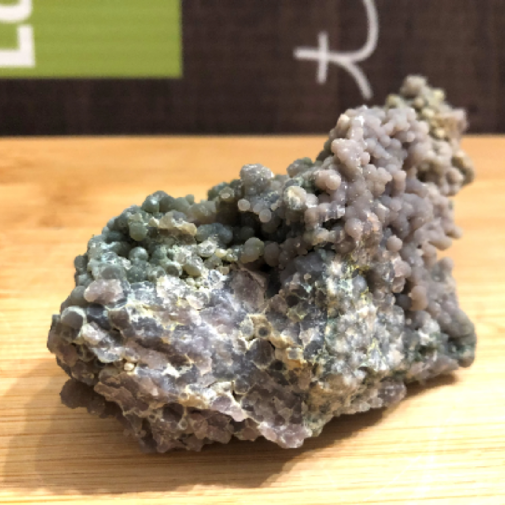 large grape agate cluster, also known as purple botryoid chalcedony, purple Manakarra chalcedony, leads us towards serenity
