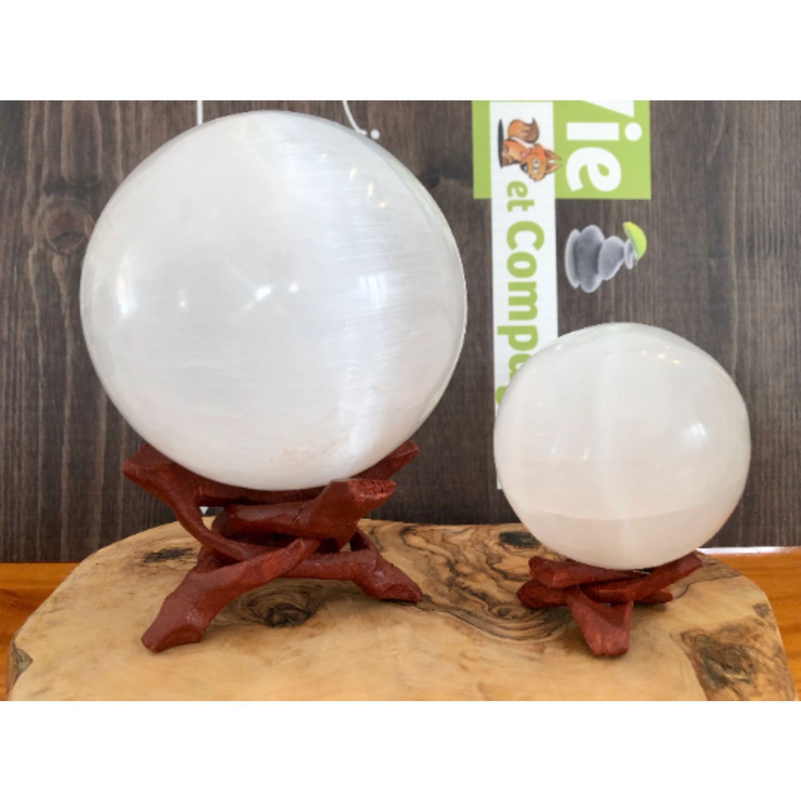 selenite sphere, selenite ball, light base LED available in the store,  is known to act as a purifying and charging agent for your crystals
