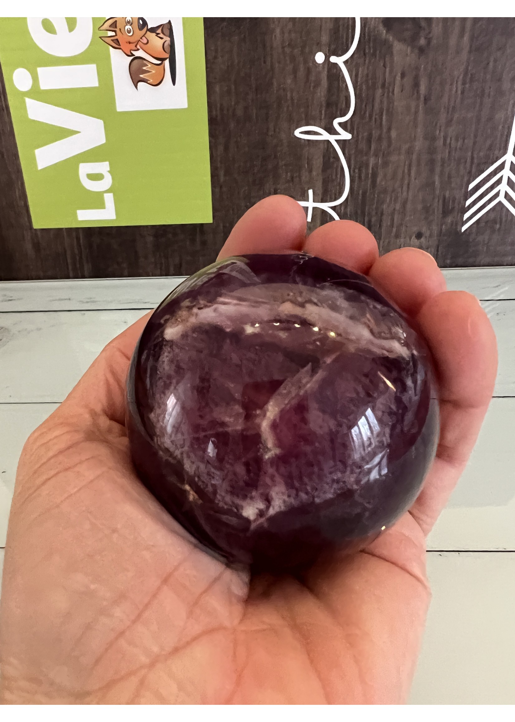 high quality purple fluorite sphere, calms agitations and reflection by promoting letting go, absorbs harmful energies