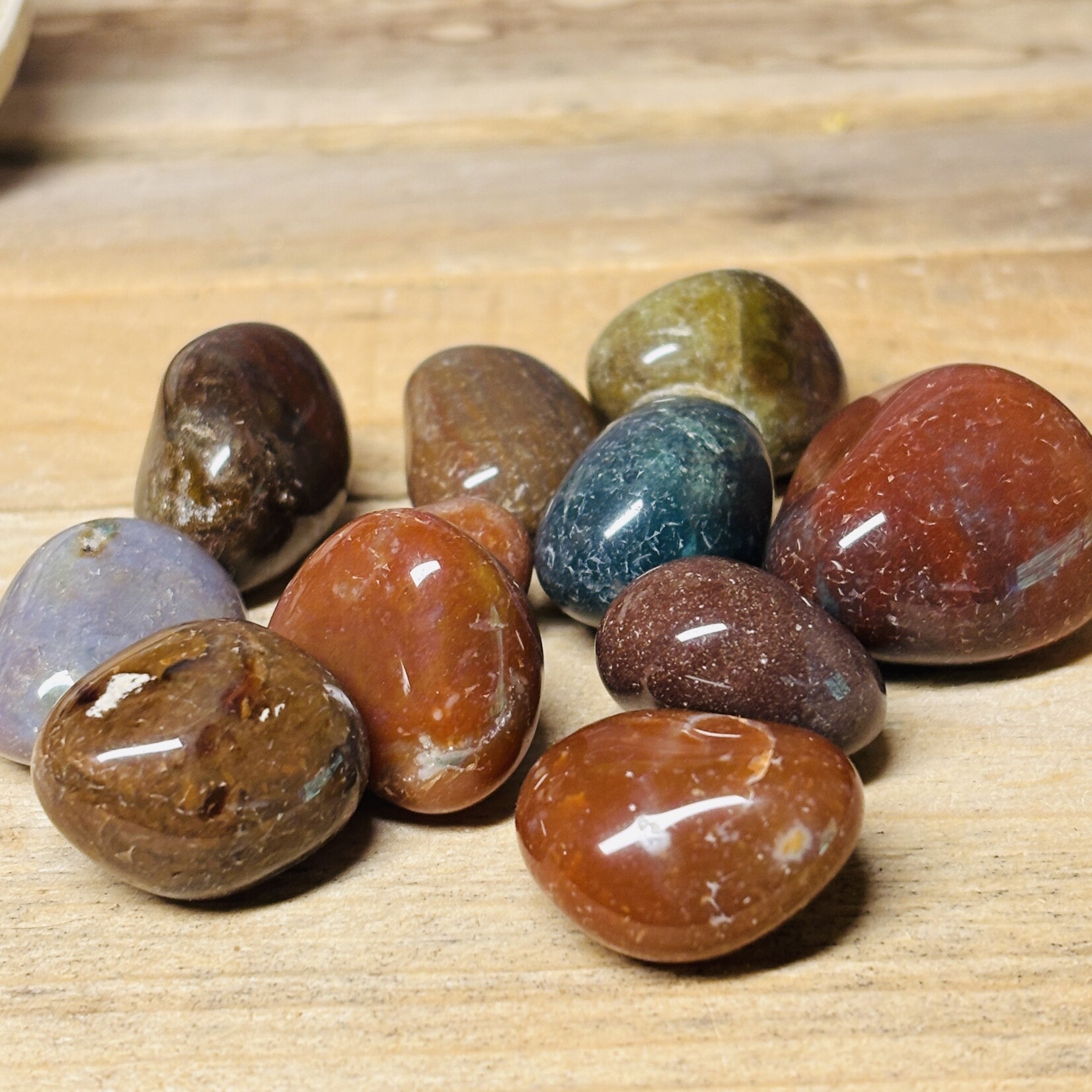 Assortment of tumbled stones: Jasper, Quartz, Amethyst, Pyrite, Lava Stone, Rubellite, Agate, Yellow Jasper, Pink Aventurine