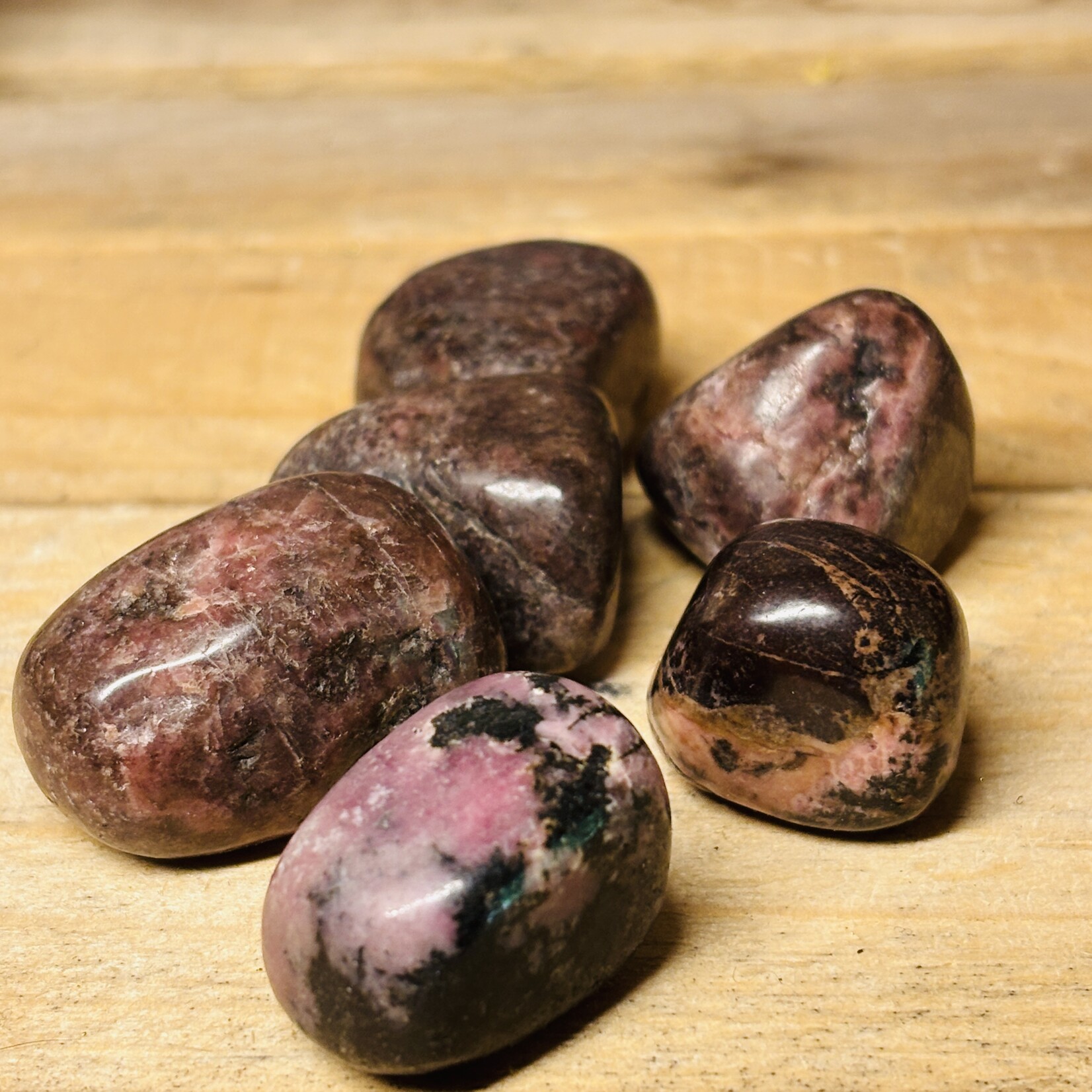 Assortment of tumbled stones: Hawk's eye, Rhodonite, Red Jasper, Blue Onyx, Howlite