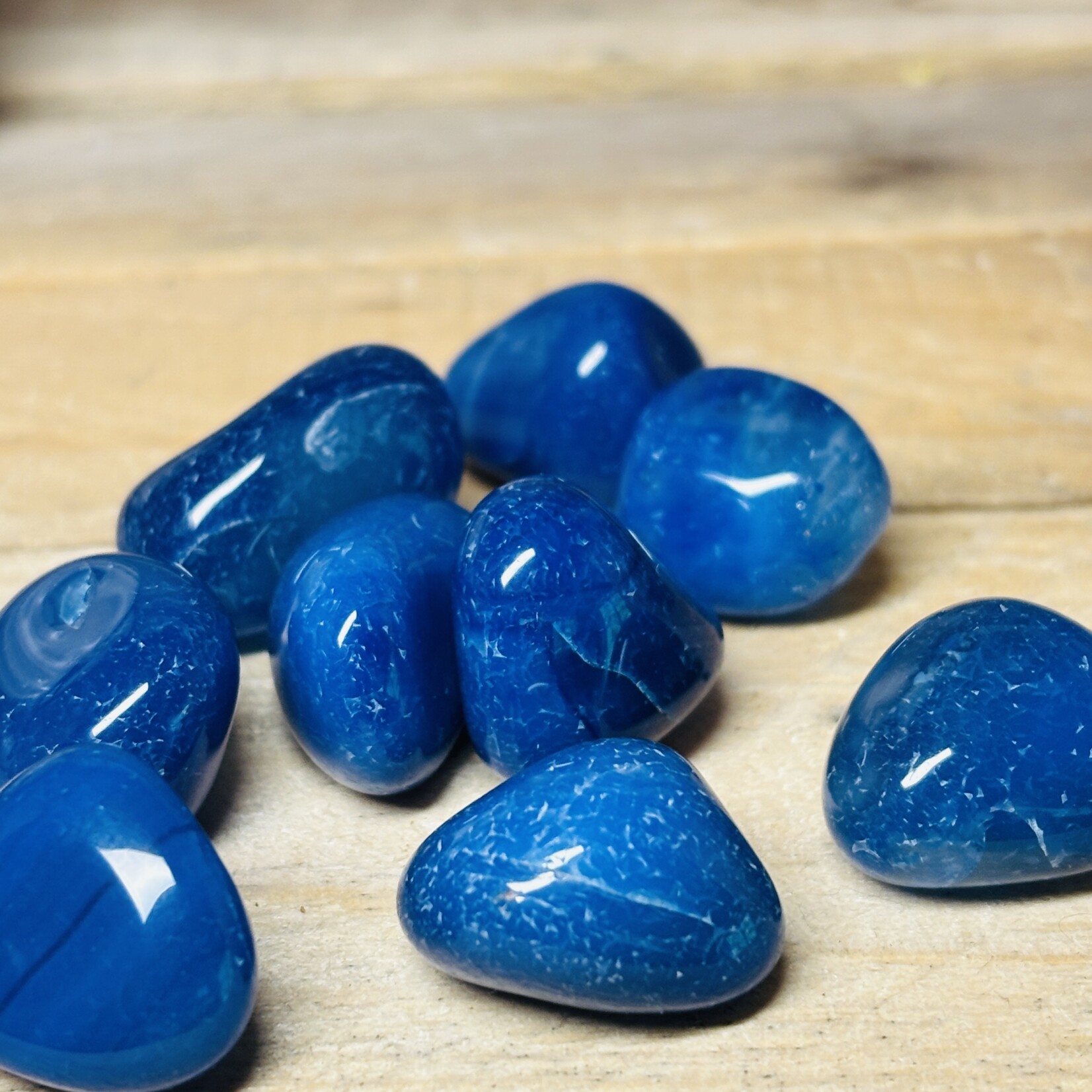 Assortment of tumbled stones: Hawk's eye, Rhodonite, Red Jasper, Blue Onyx, Howlite