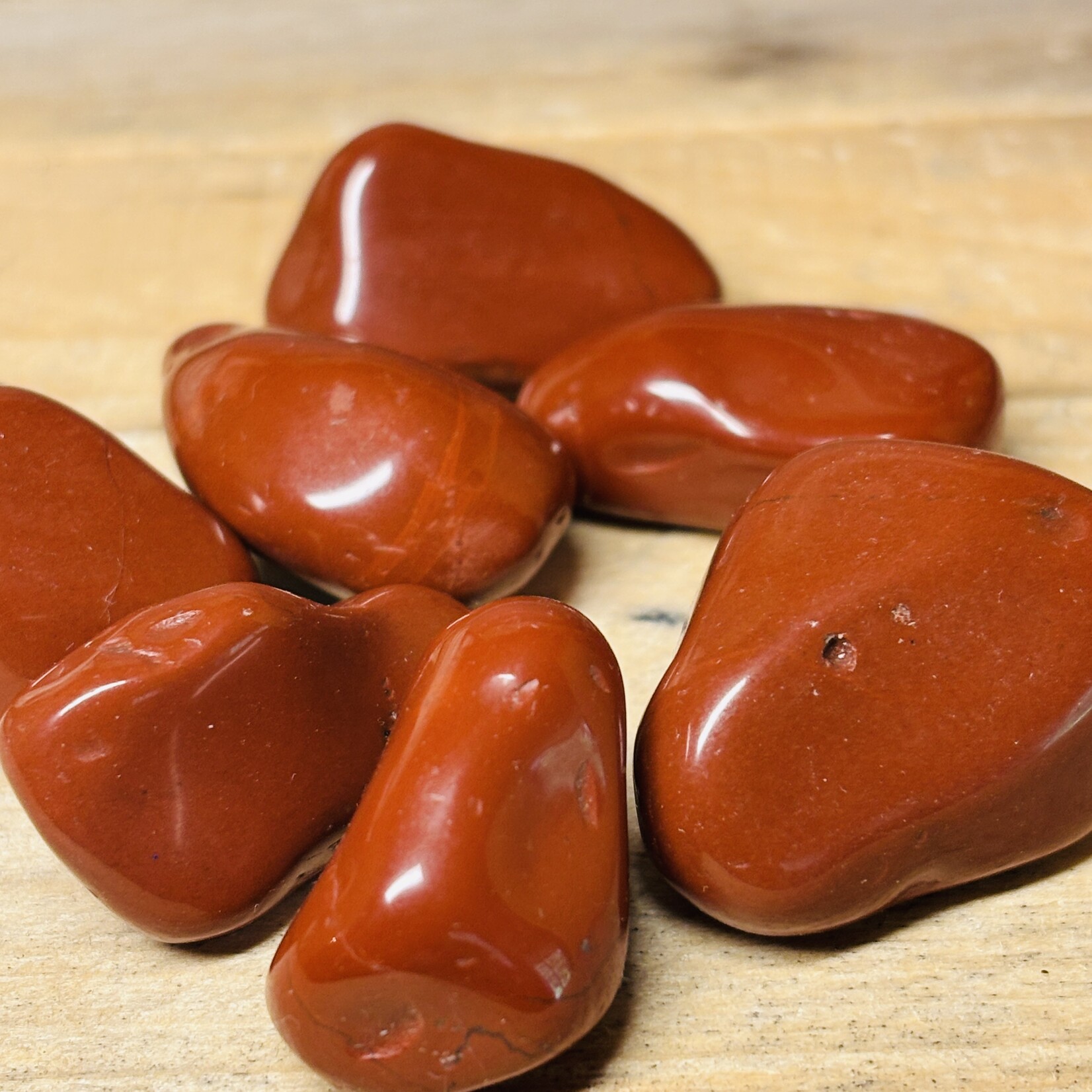 Assortment of tumbled stones: Hawk's eye, Rhodonite, Red Jasper, Blue Onyx, Howlite