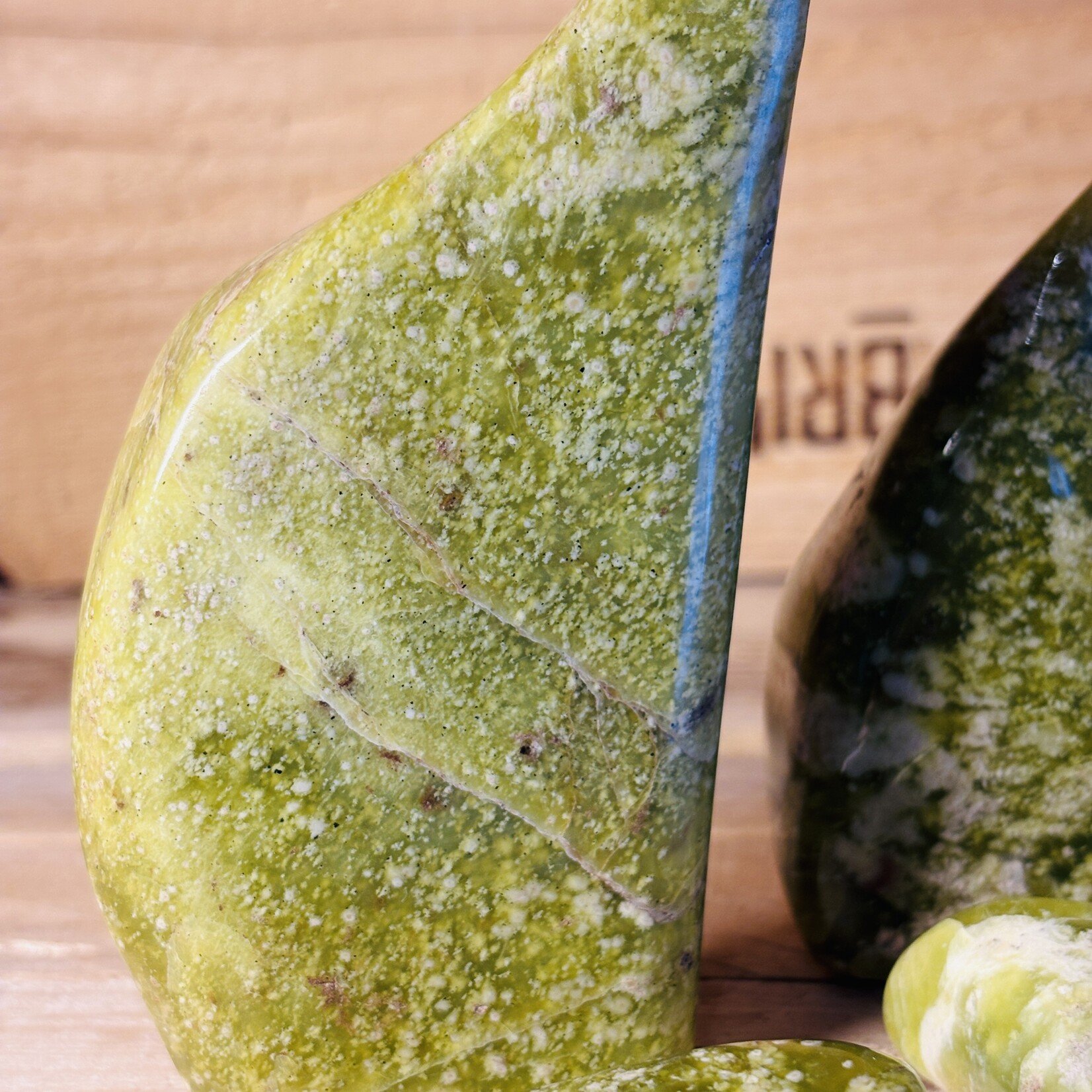 green serpentine stone  free form, natural brazilian serpentine with pyrite, crystal point, stone against migraine