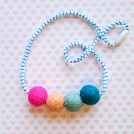 whimsical woolies (faire) woolies diffusing necklace, teal & pink
