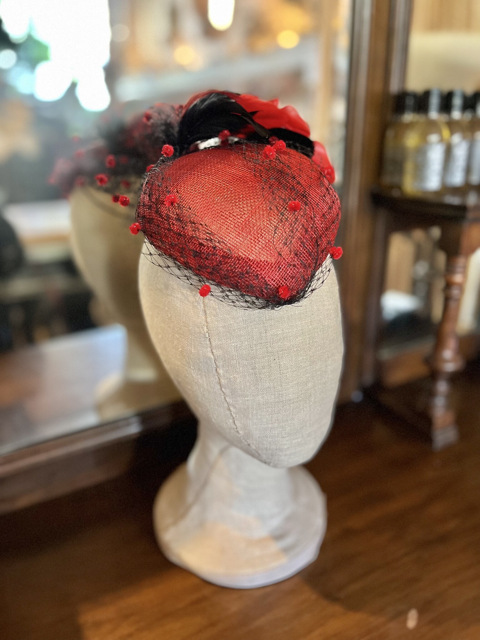 Kalico Delafay Red Sinamay Teardrop Fascinator with Black Veil, Chenille Dots, & Black and Red Feathers-1
