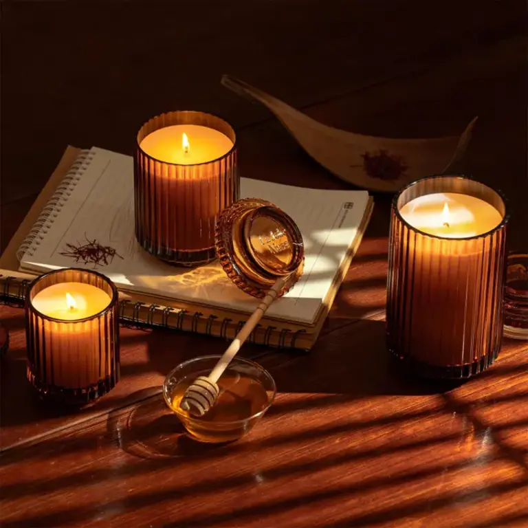 La Jolie Muse Amélie 7oz Candle in Saffron & Oud