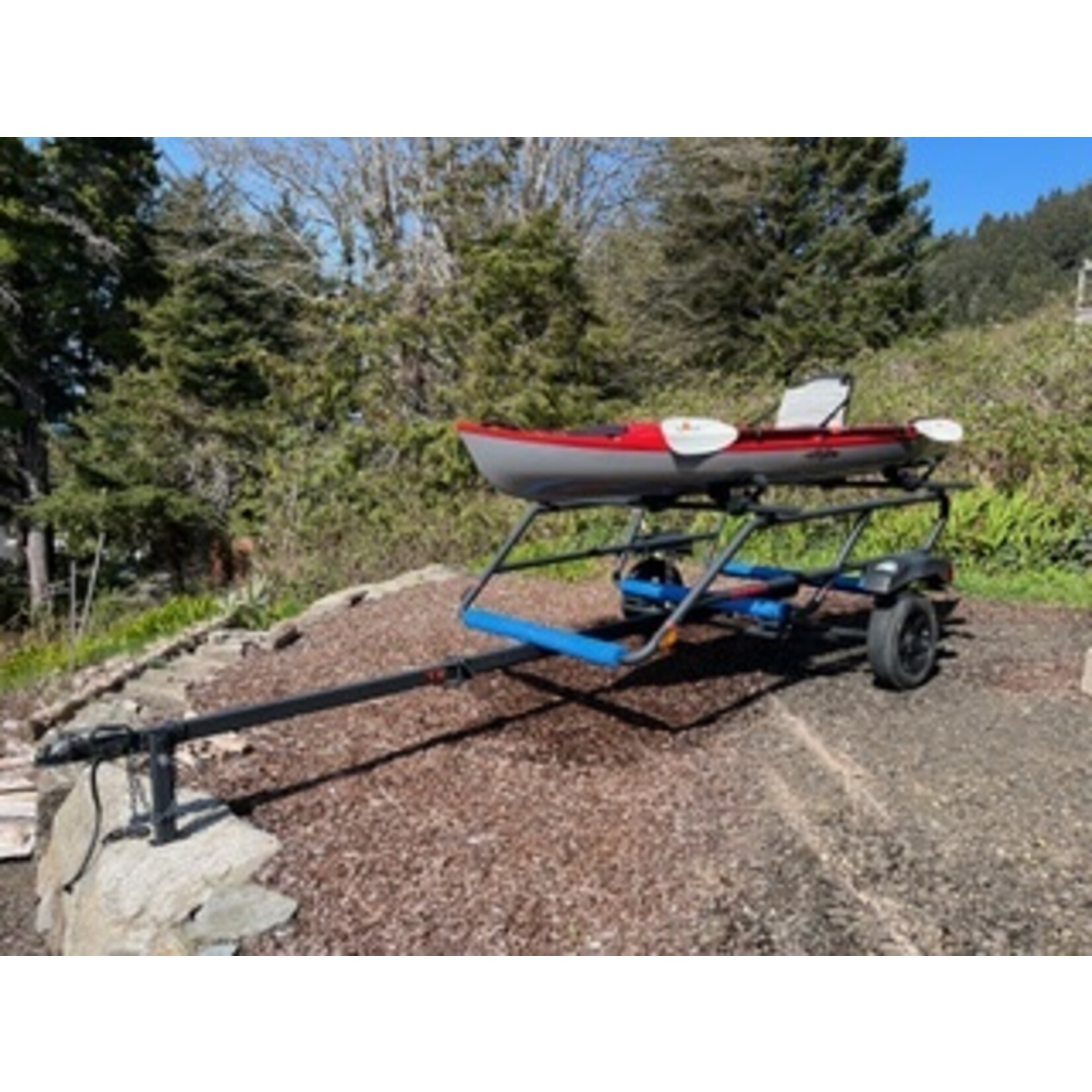 Used Eddyline Caribbean 12 FS and Yakima Trailer Package
