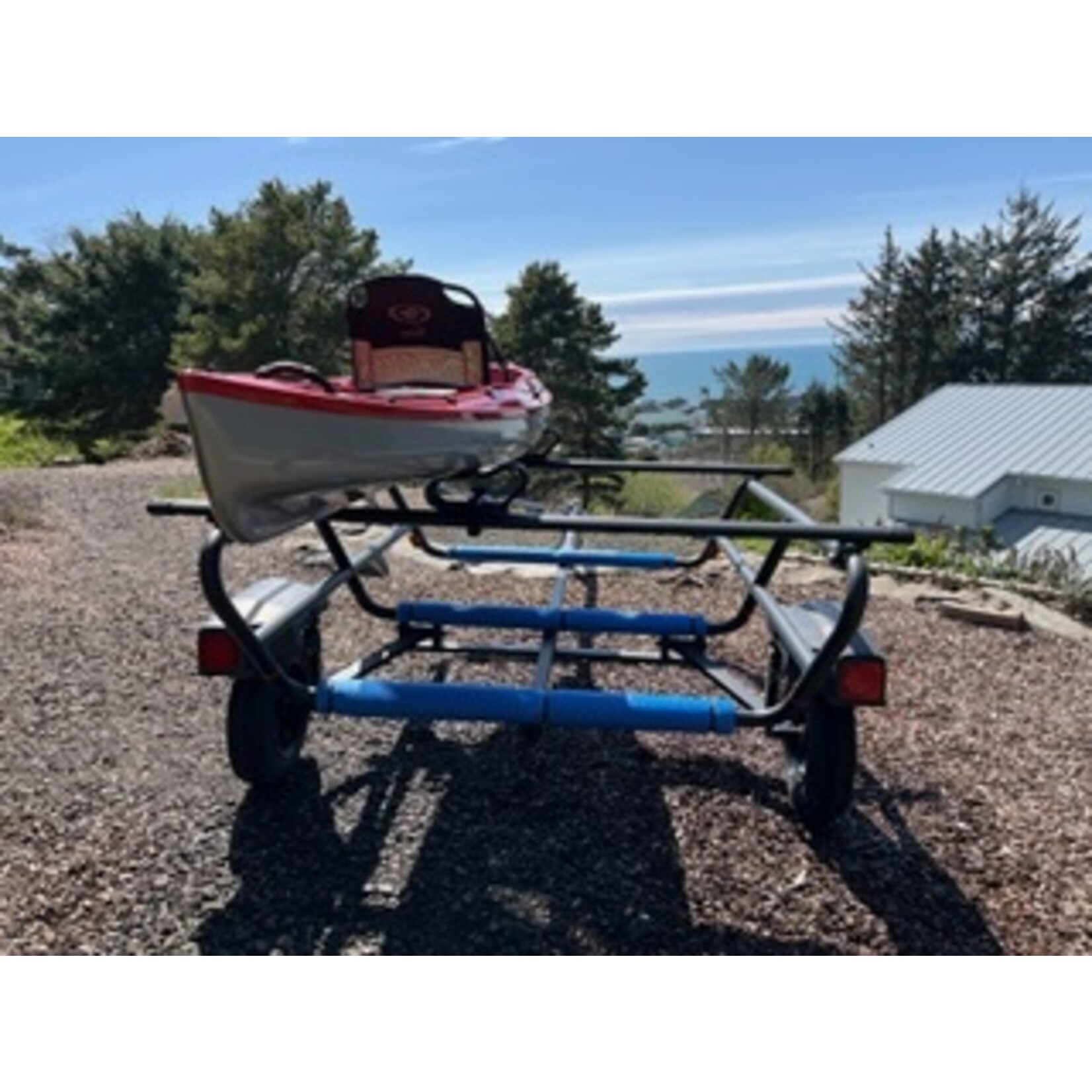 Used Eddyline Caribbean 12 FS and Yakima Trailer Package