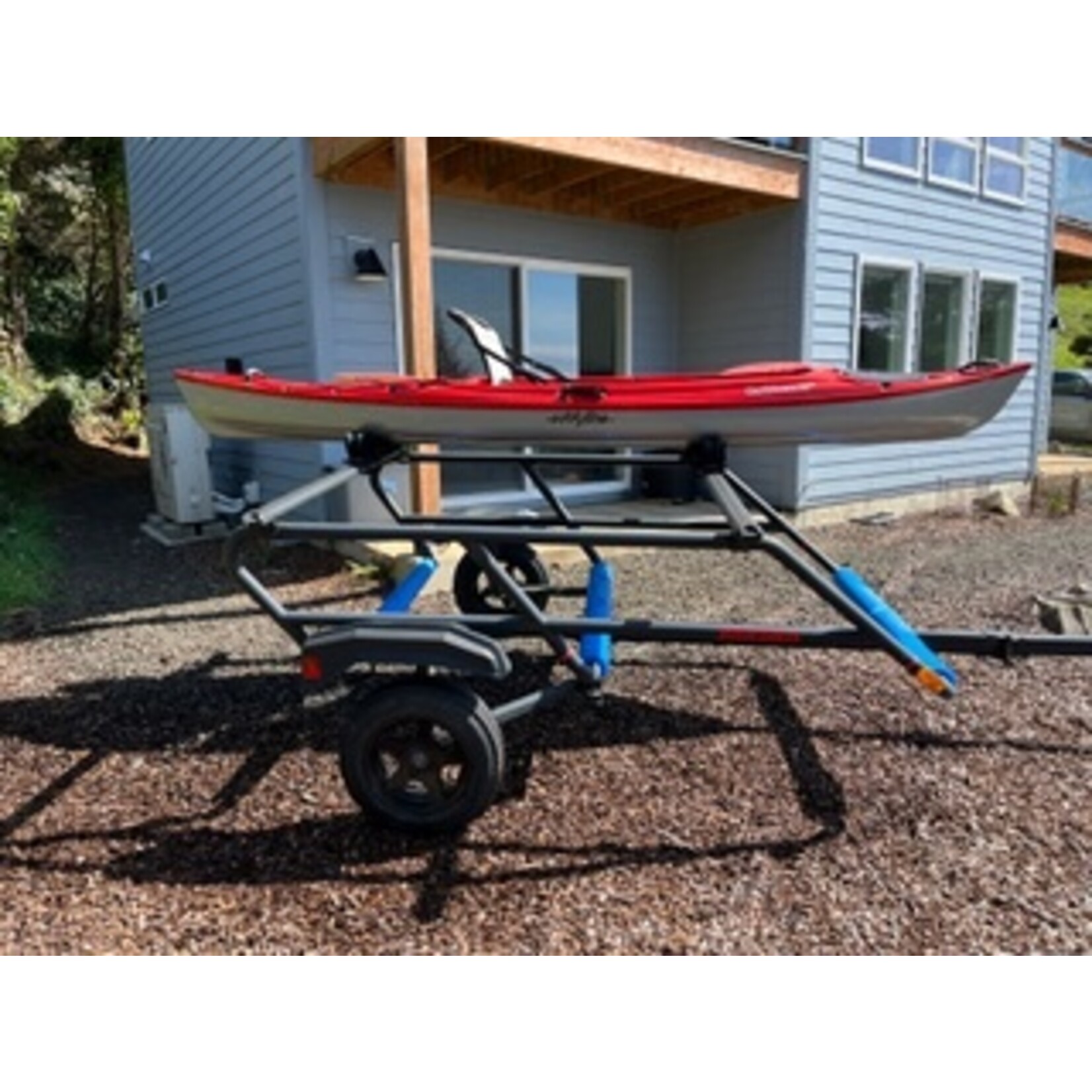 Used Eddyline Caribbean 12 FS and Yakima Trailer Package