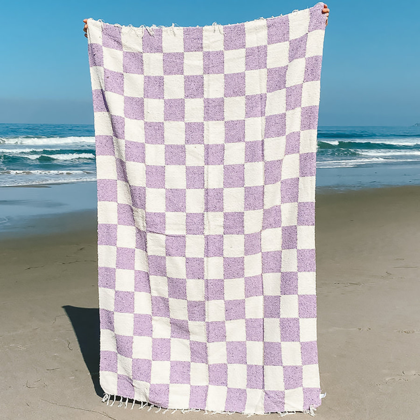 white and purple louis Vuitton blanket