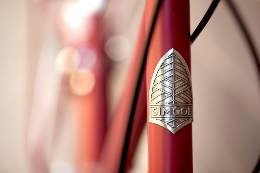 Close up of a Simcoe Bicycles head badge.