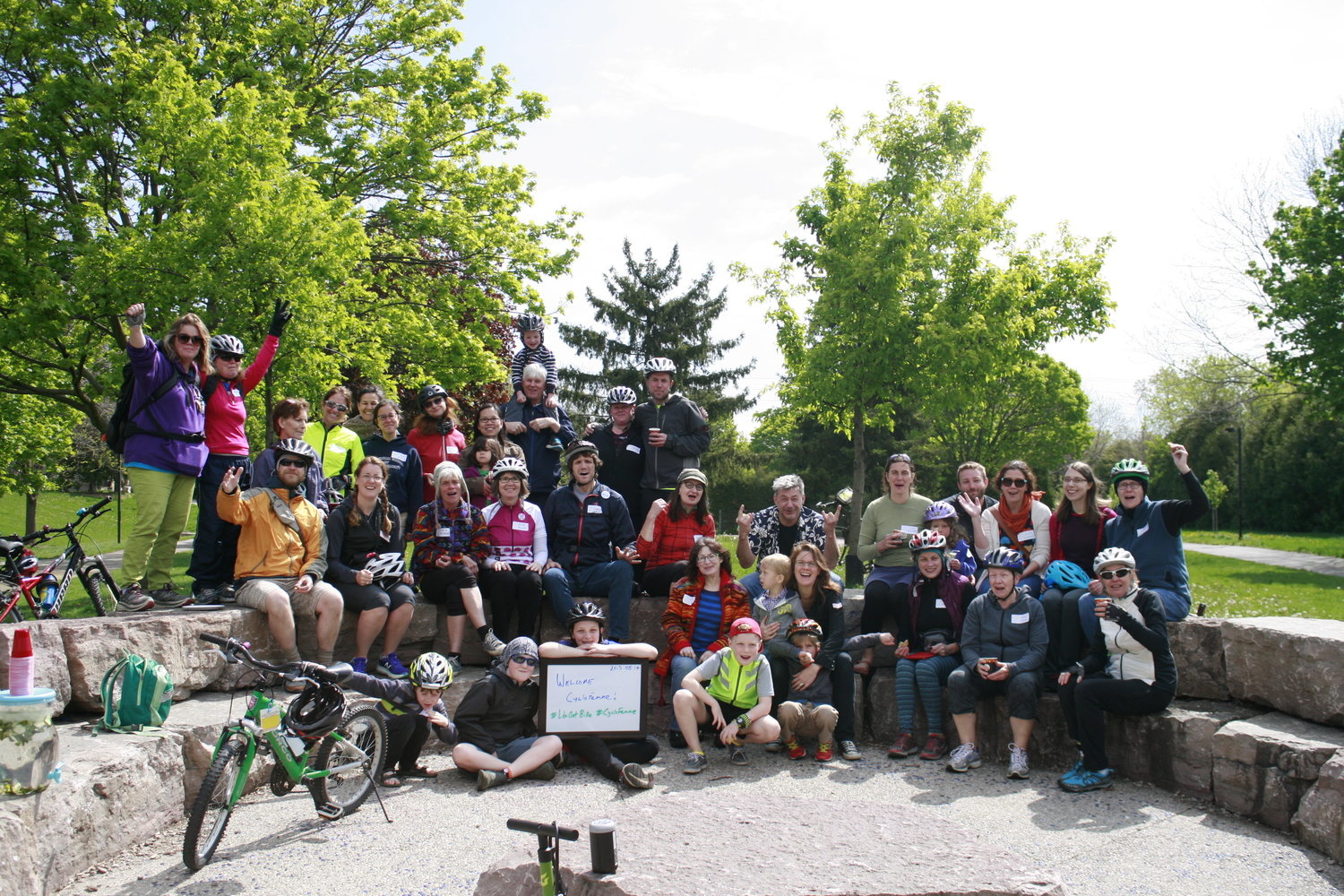 Group photo of event attendees outside in the sun