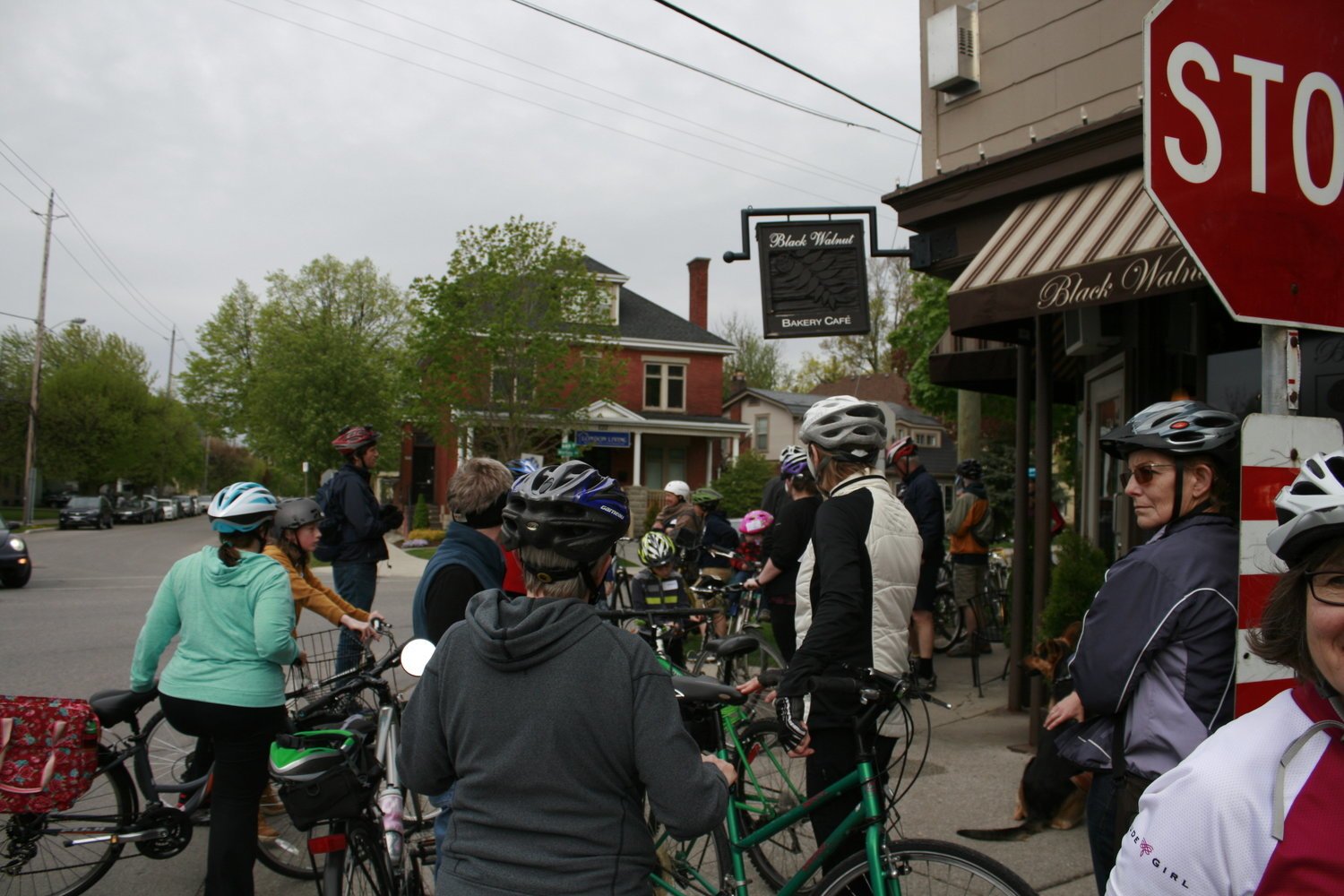 Cyclists gather outside of Black Walnut Bakery for a break.