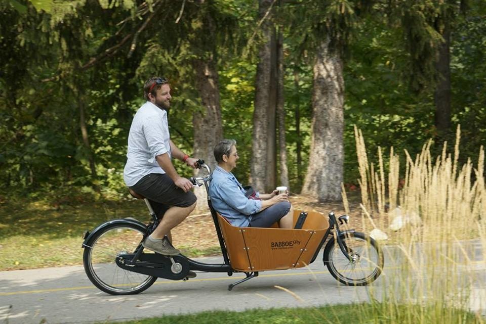 Ben gives his mom a ride in the Babboe bakfiets