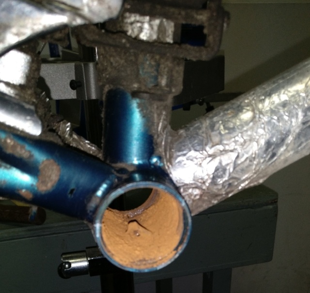 A close up of a rusted out bottom bracket on a poorly maintained bike.