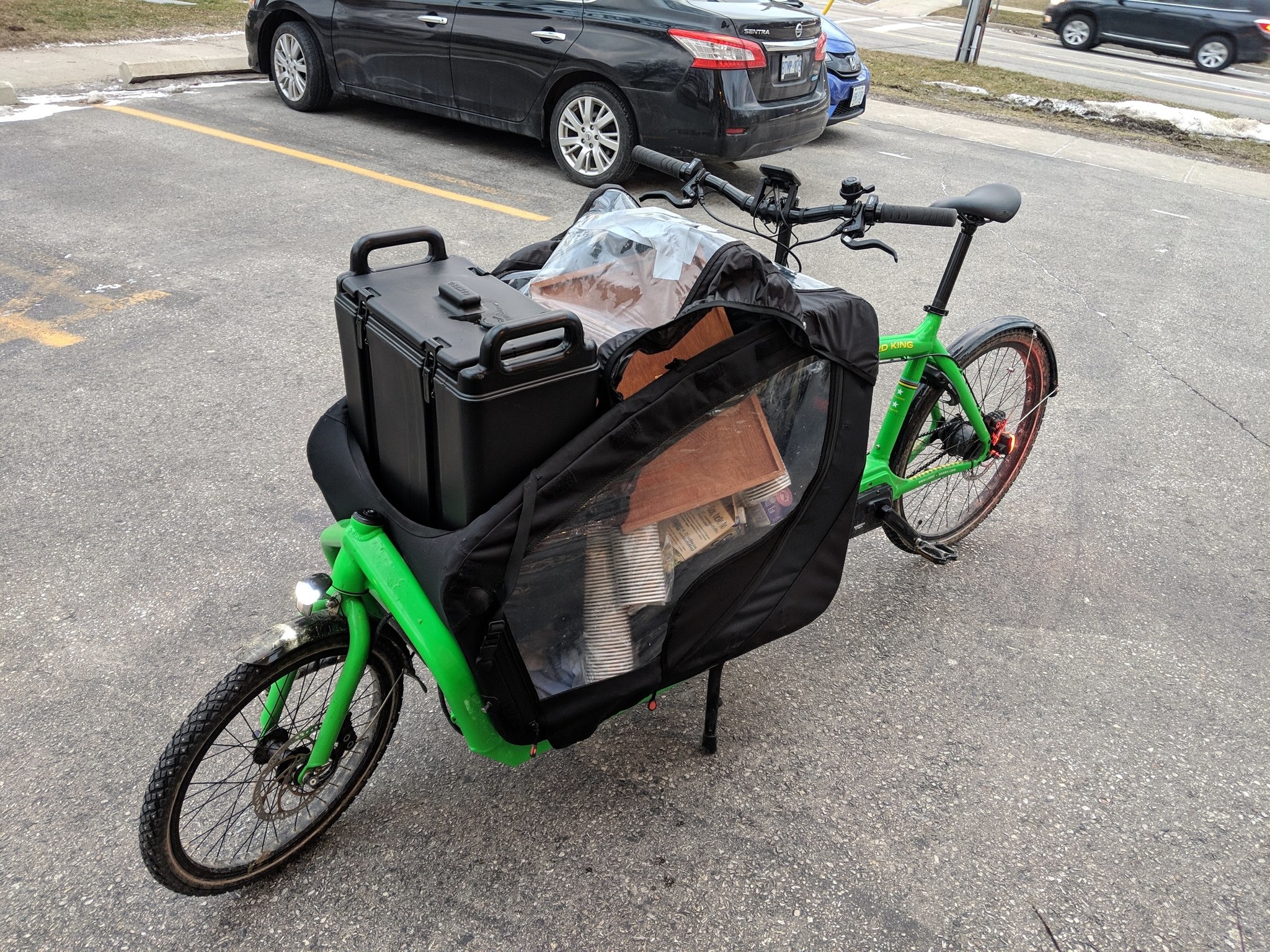 The Bullitt long john holds a cambro container of coffee and the associated supplies.