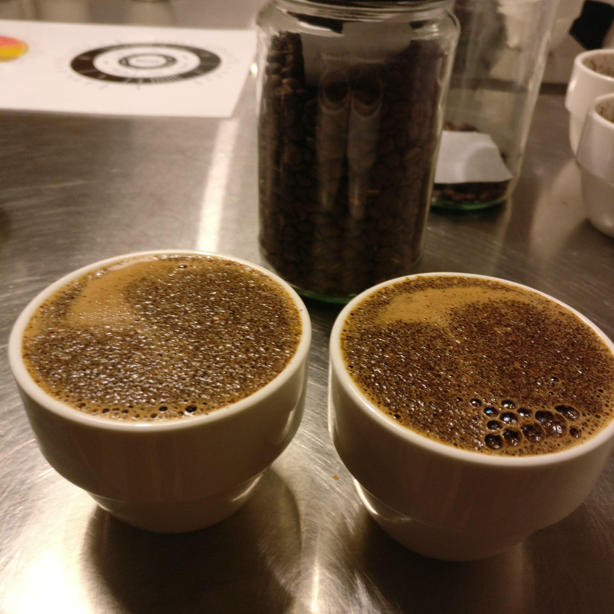 A close up of two prepared cups for the cupping.