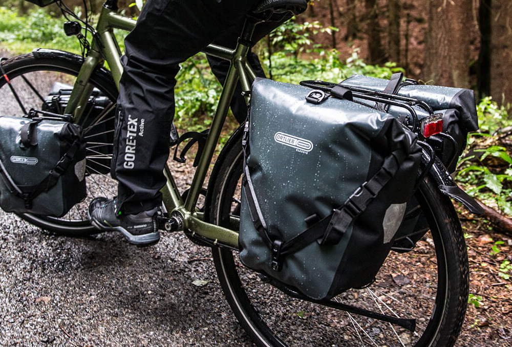 Close up of an Ortlieb pannier staying dry in wet conditions.