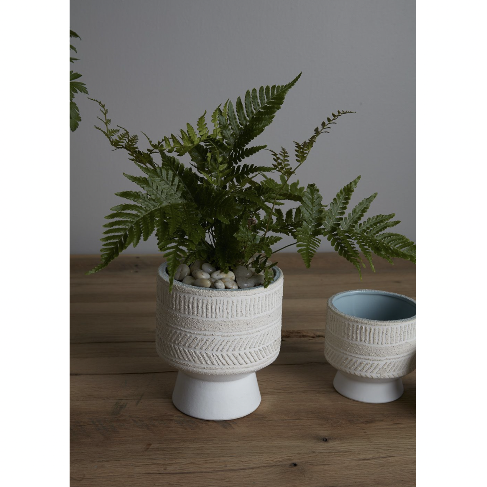 6.25”H X 5” WHITE CERAMIC UMBRA FOOTED POT VASE