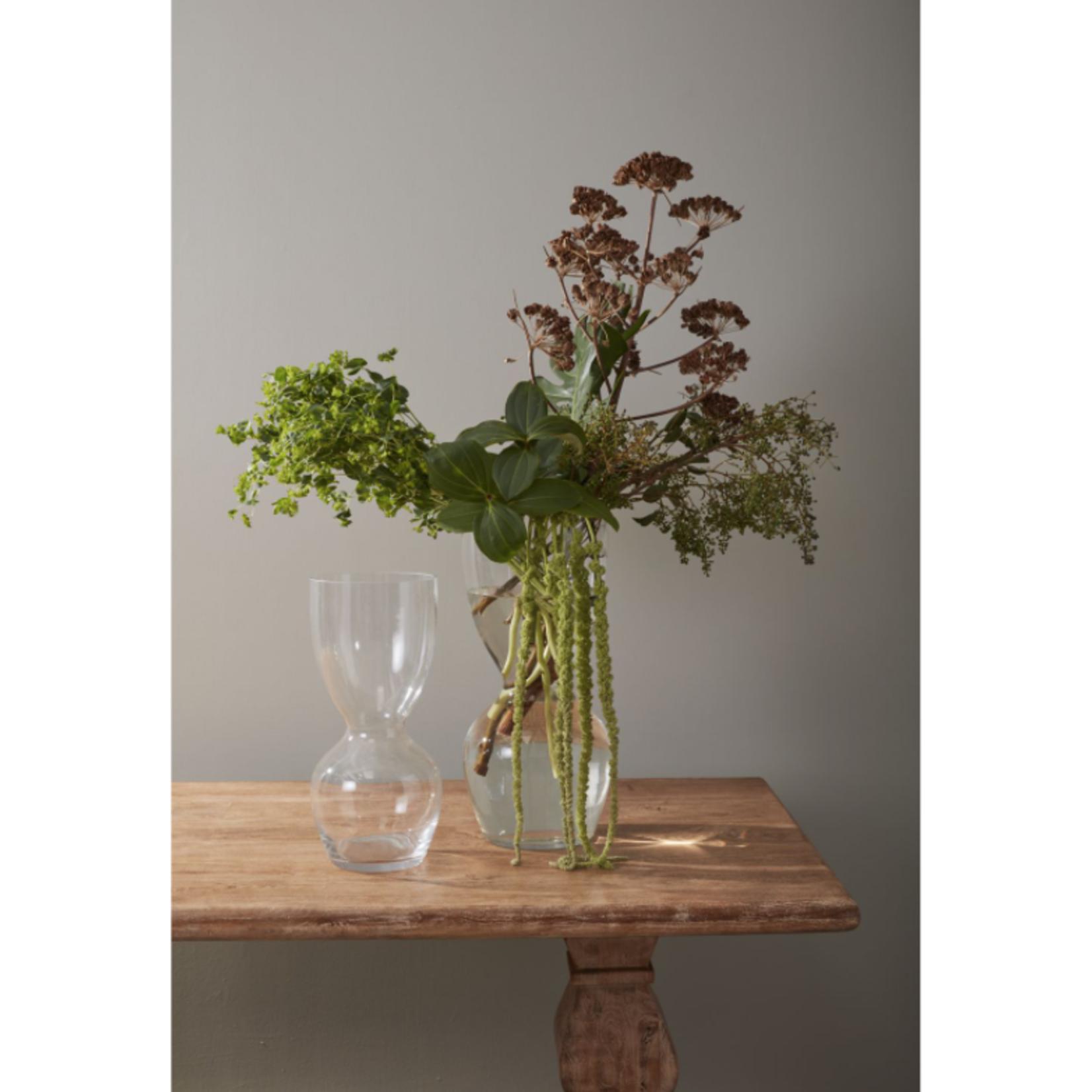 40% off was $170 now$101.99. 23”H X 11” GLASS CAMPANA VASE