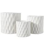 4.25”H X 4.25” SMALL WHITE CERAMIC CYLINDER WITH WAVE DESIGN PATTERN
