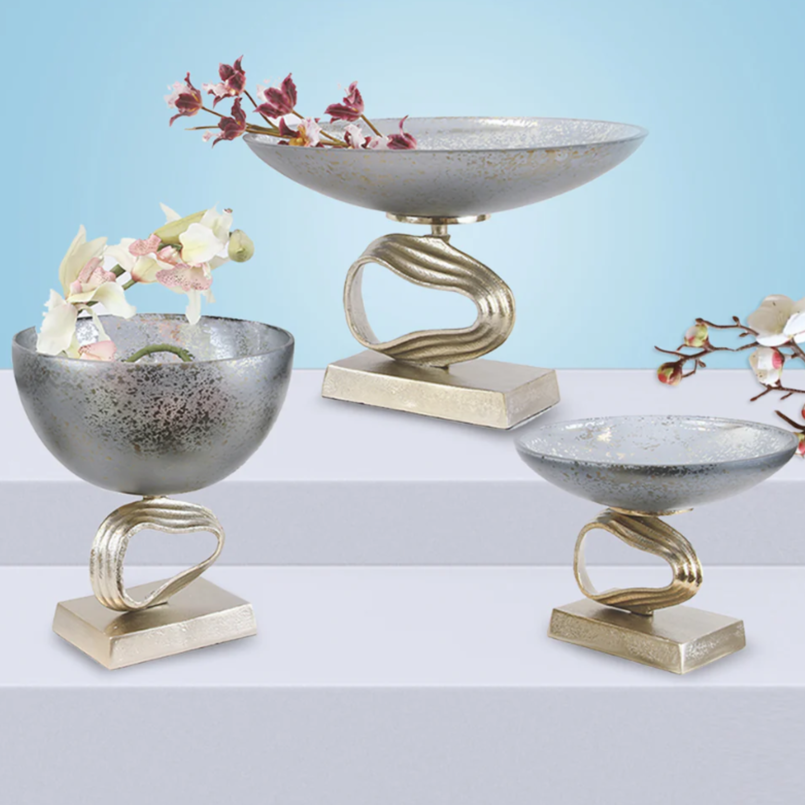 50% off was $130 now $$65. 8.75”H X 13” GLAM GLASS WITH CHAMPAGNE STAND