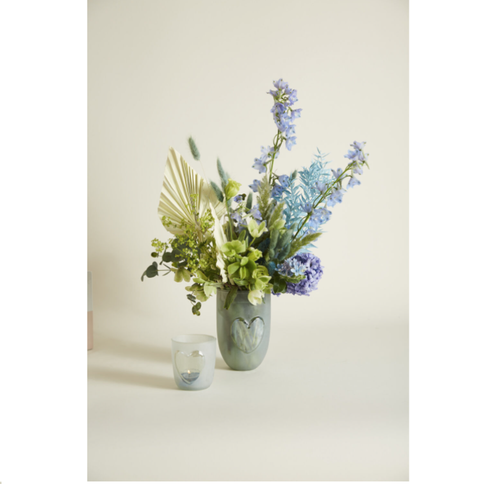 50% off was $15 now $7.50. 6”H X 4” GLASS HEARTS AGLOW VASE/VOTIVE