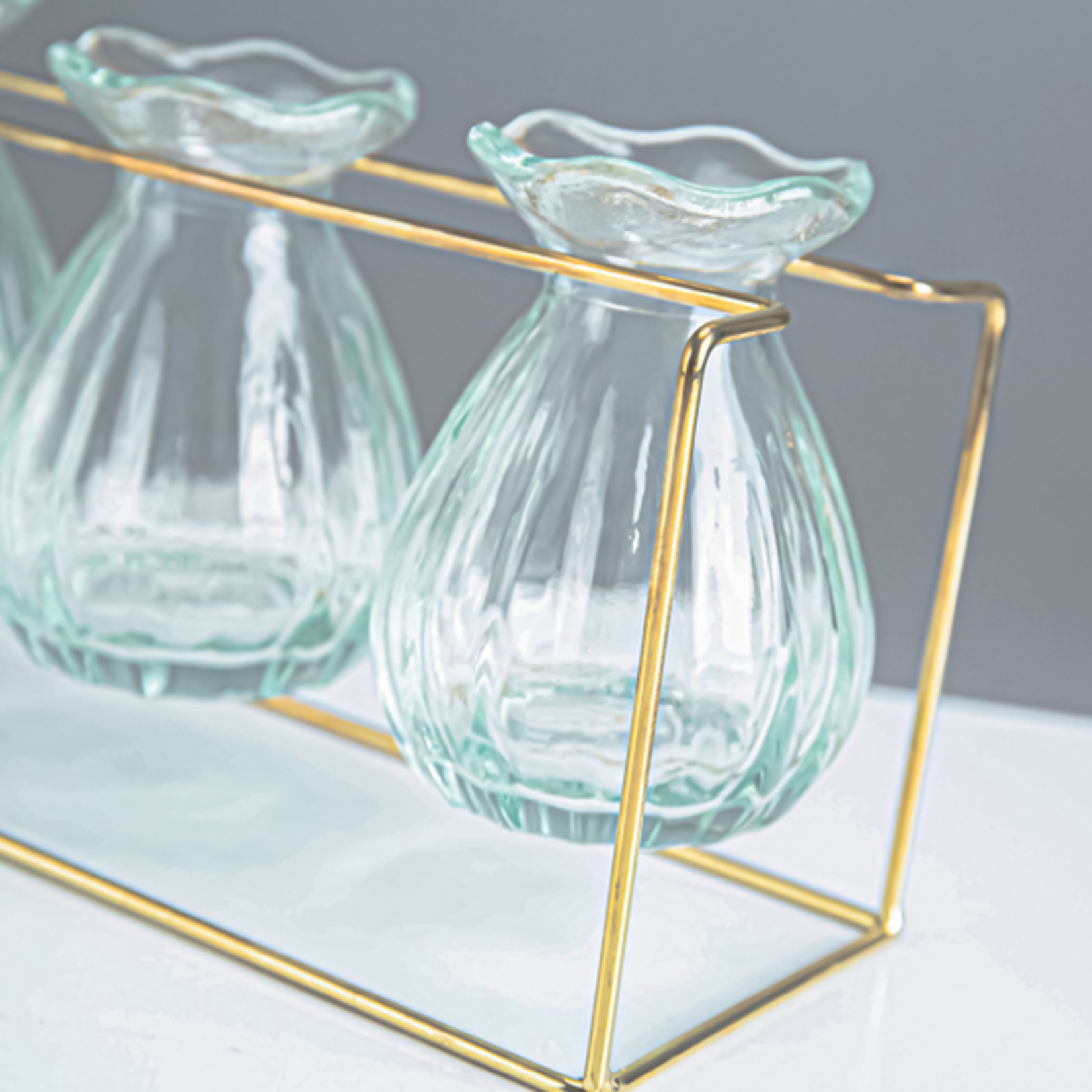 4.5”H X 8.75“L X 3.25” THREE(3) GLASS BUD VASES WITH GOLD STAND