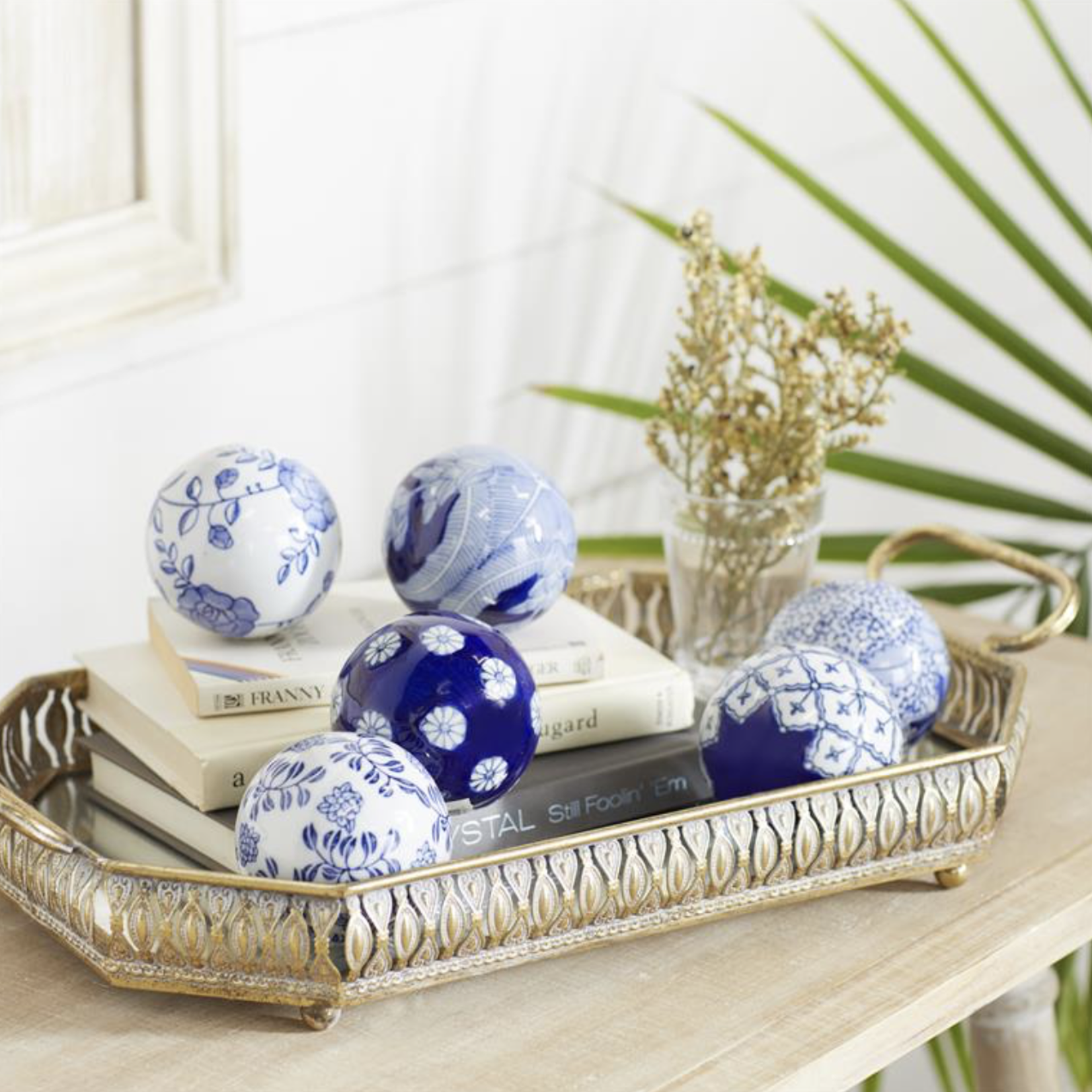 50% off was $7 now $3.50. 3.15”d BLUE CERAMIC FLORAL HANDMADE GLOSSY DECORATIVE BALL ORBS & VASE FILLER WITH VARYING PATTERNS (price per each, box has assortment)