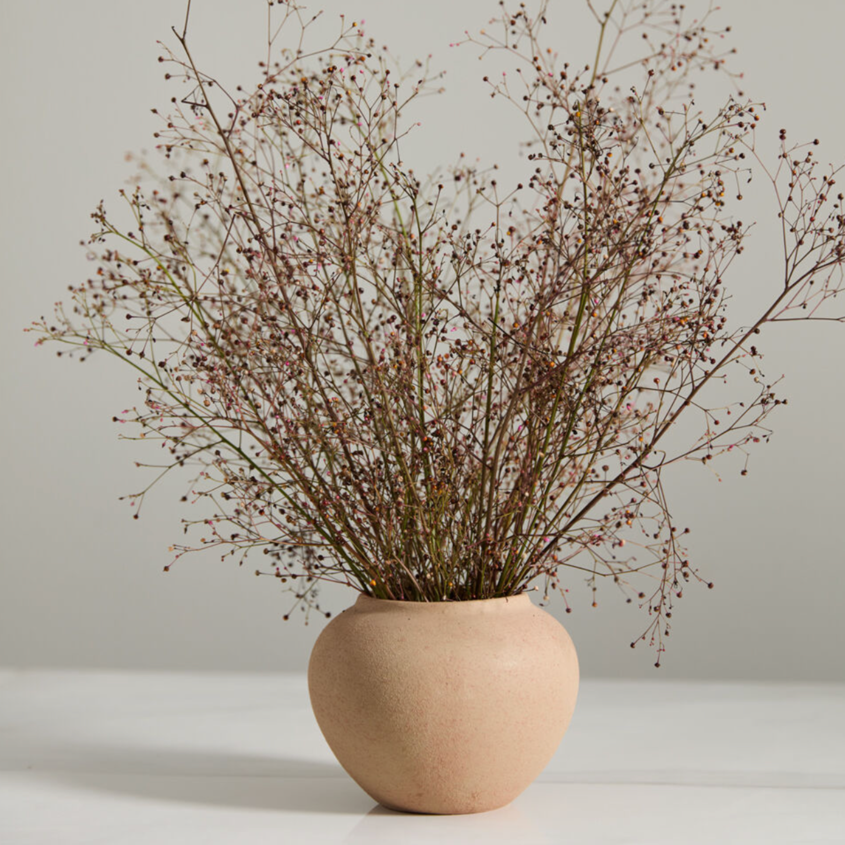 4.5”H X 5.5” TAN CERAMIC KASTANOS VASE