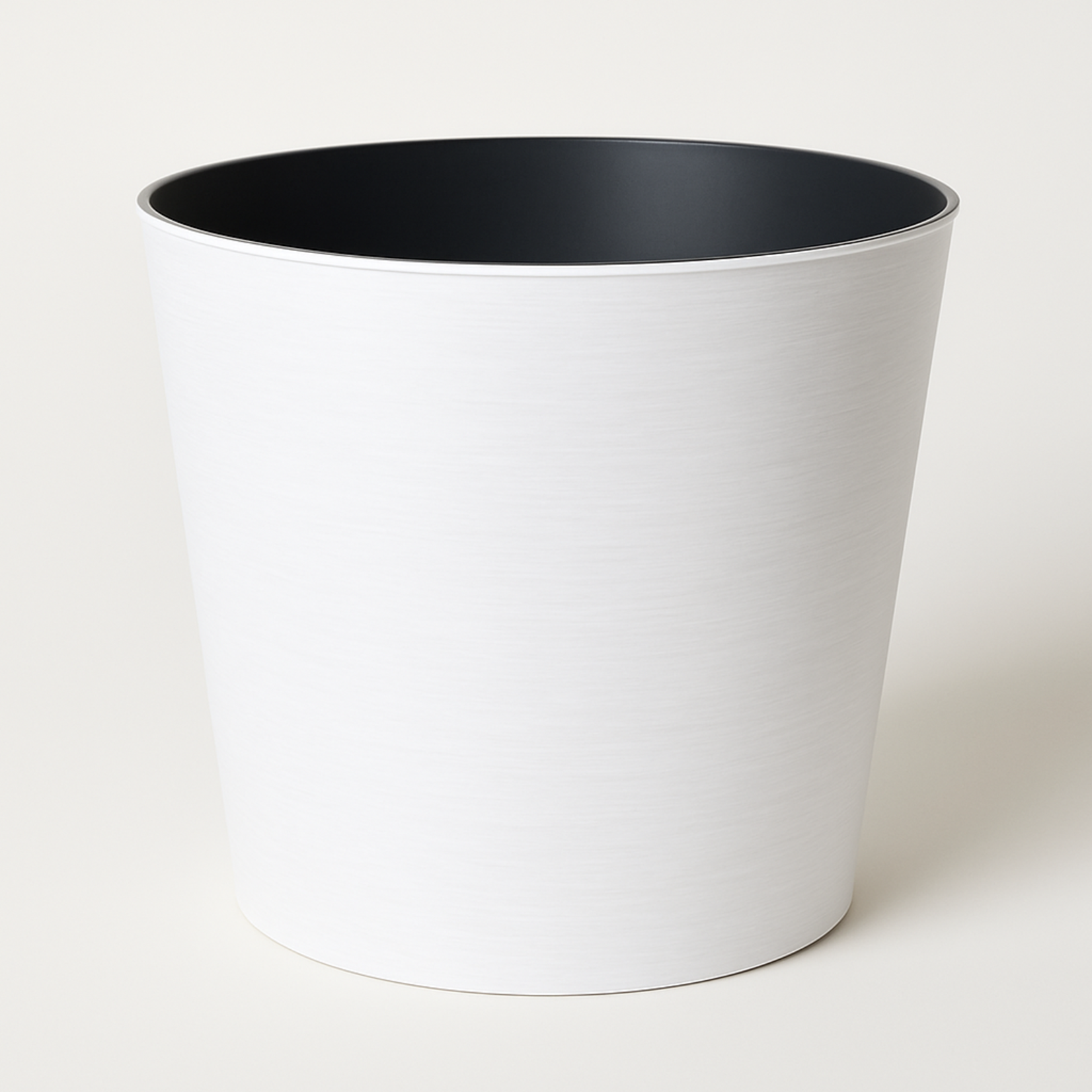 4.5”H X 4.75” WHITE PLASTIC TAPERED CYLINDER